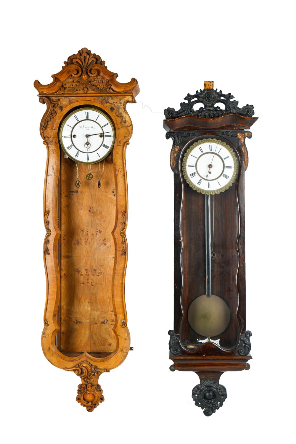 TWO CARVED WOOD WALL CLOCKSthe 33691b