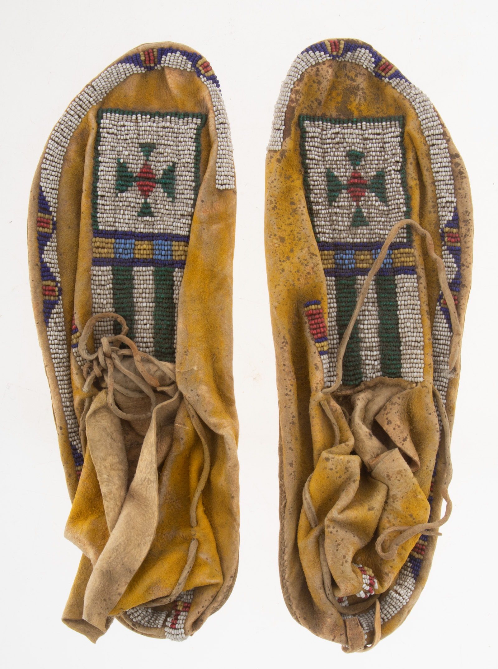 A PAIR OF HIGH PLAINS BEADED LEATHER