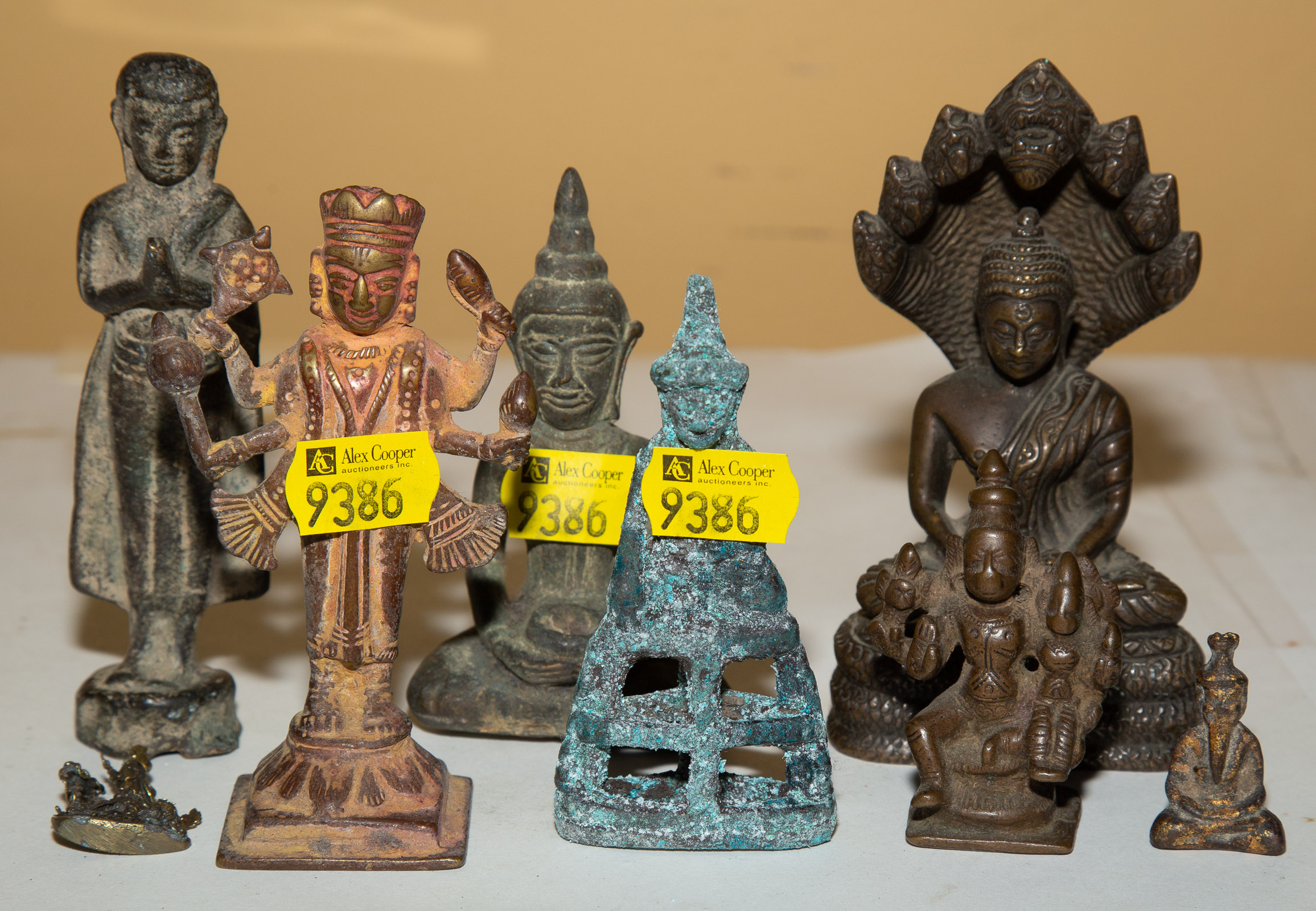 EIGHT ASIAN BRONZE DEVOTIONAL FIGURES