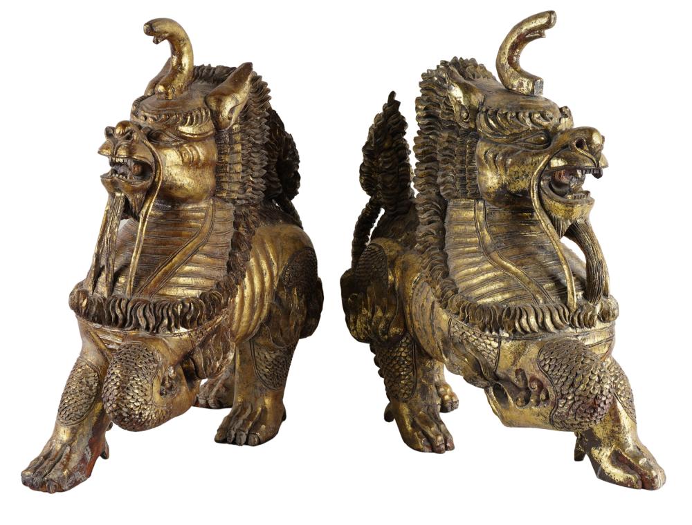 PAIR OF TEMPLE GUARDIANScarved and gilded