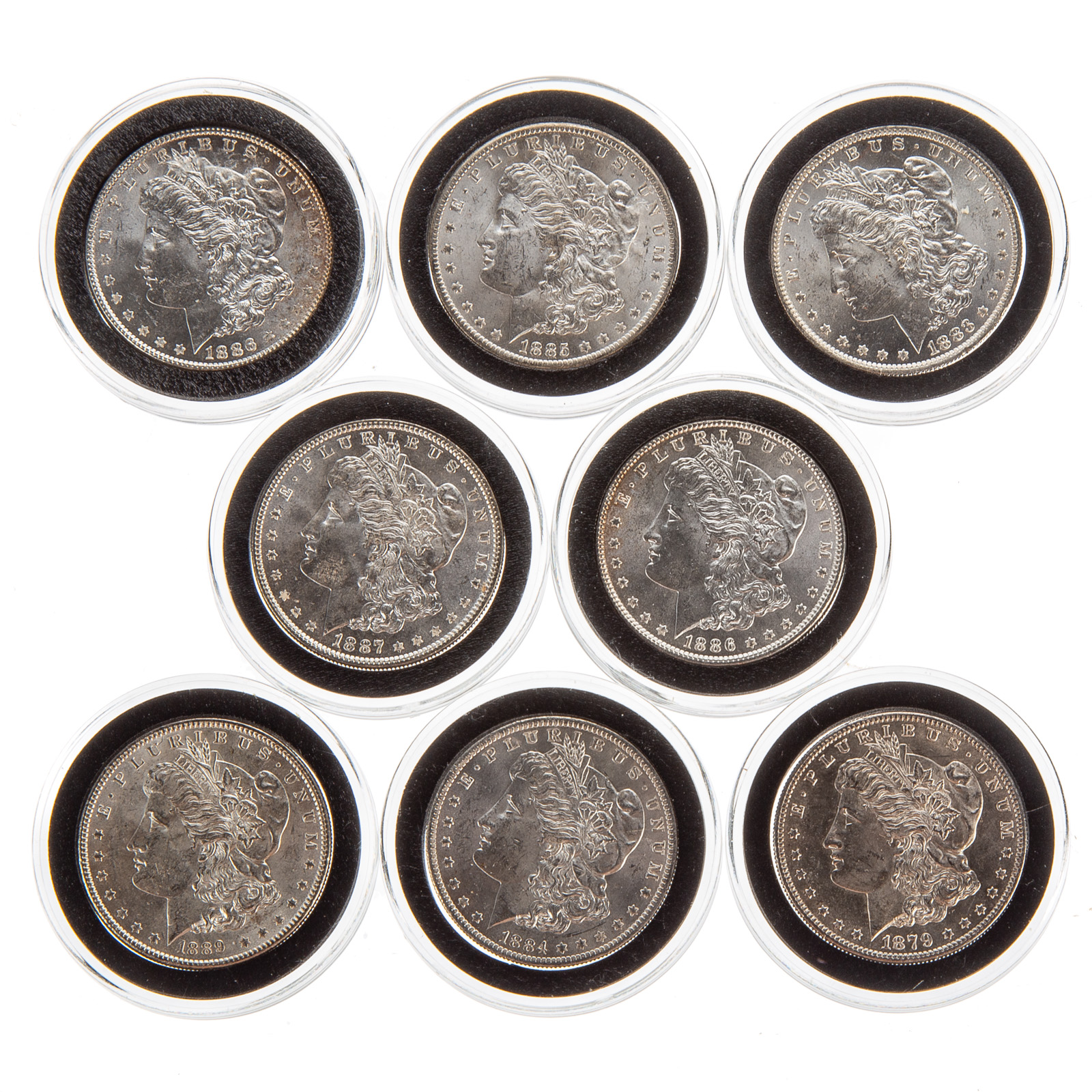 EIGHT DIFFERENT UNCIRCULATED MORGAN