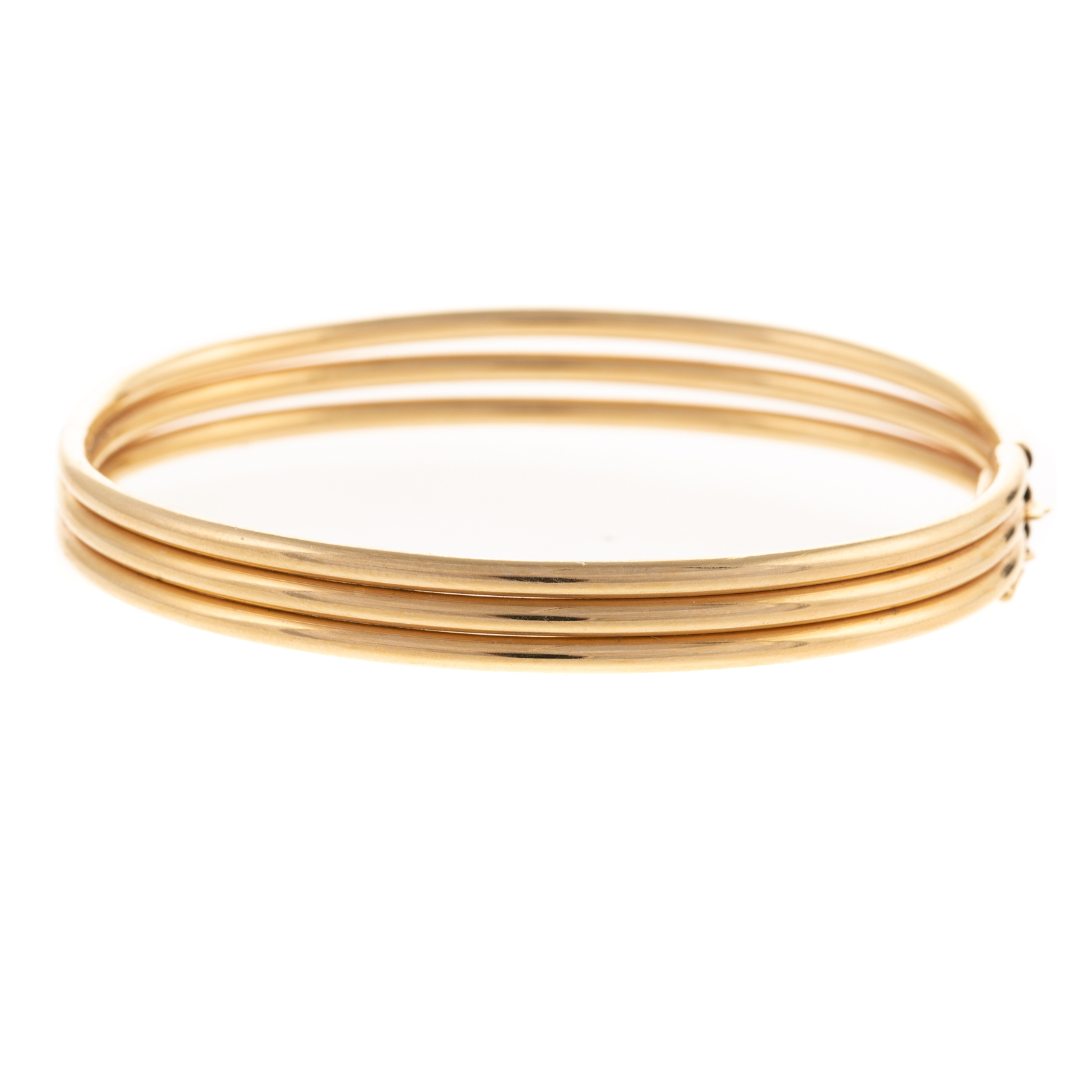 A THREE ROW OVAL HINGED BANGLE 334a80