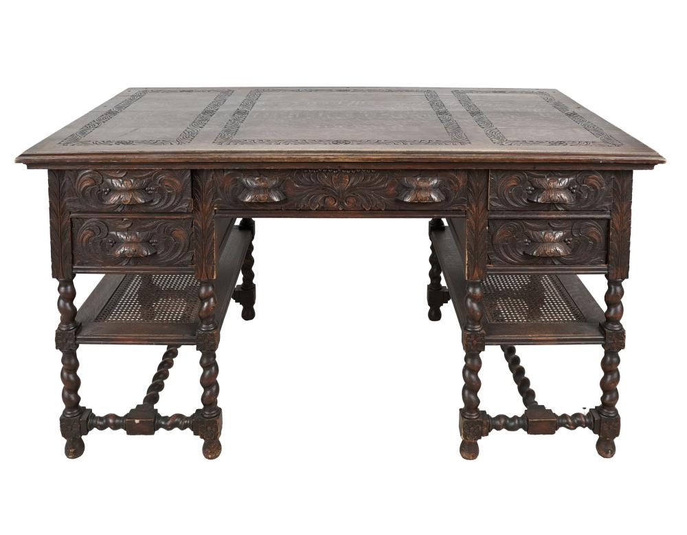 JACOBEAN STYLE CARVED OAK DESKlate