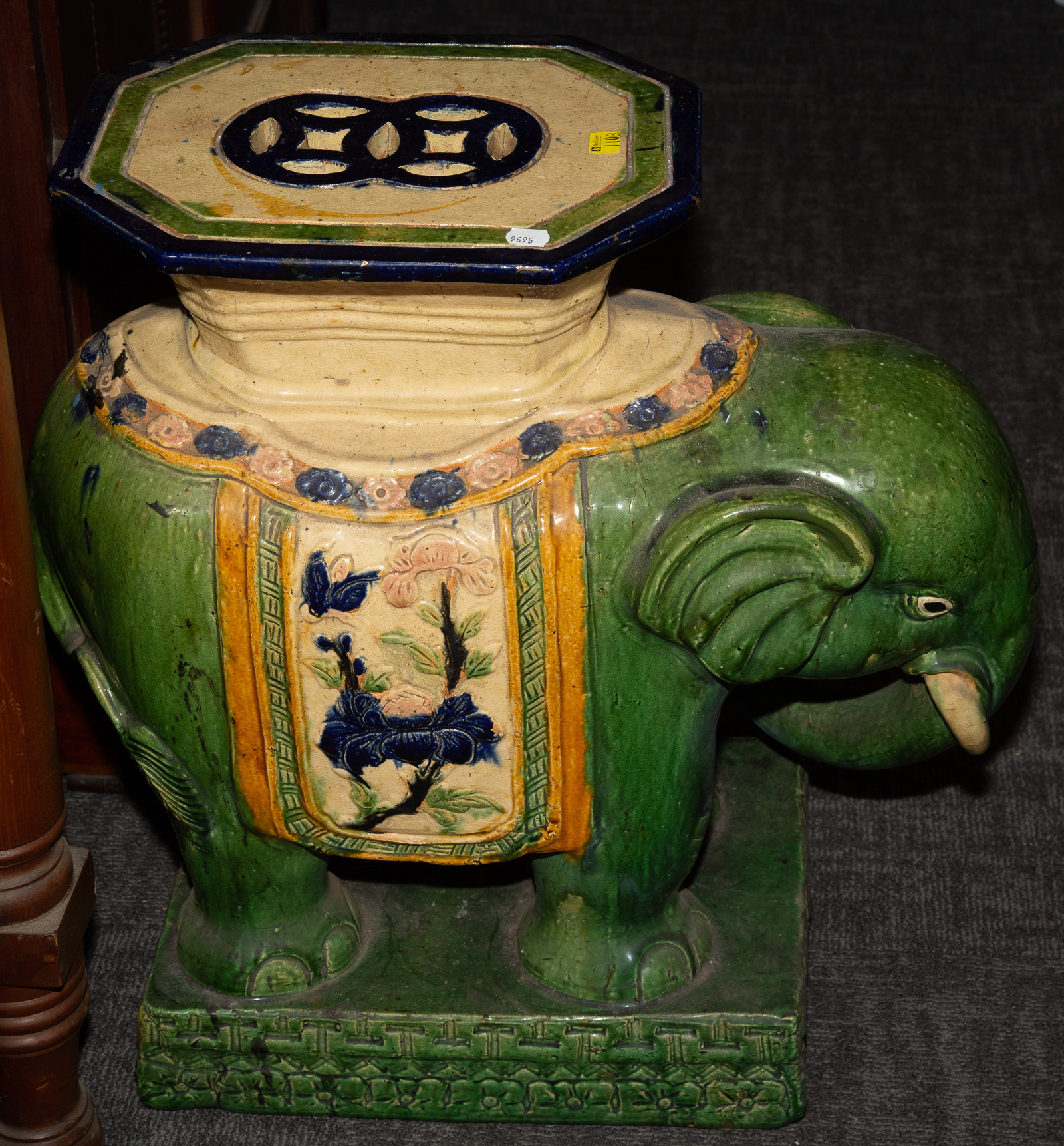 AN ELEPHANT-FORM STONEWARE GARDEN SEAT