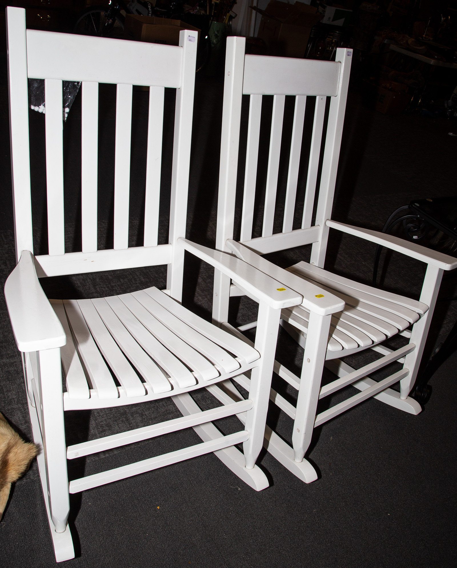 A PAIR OF LARGE WOOD ROCKERS .