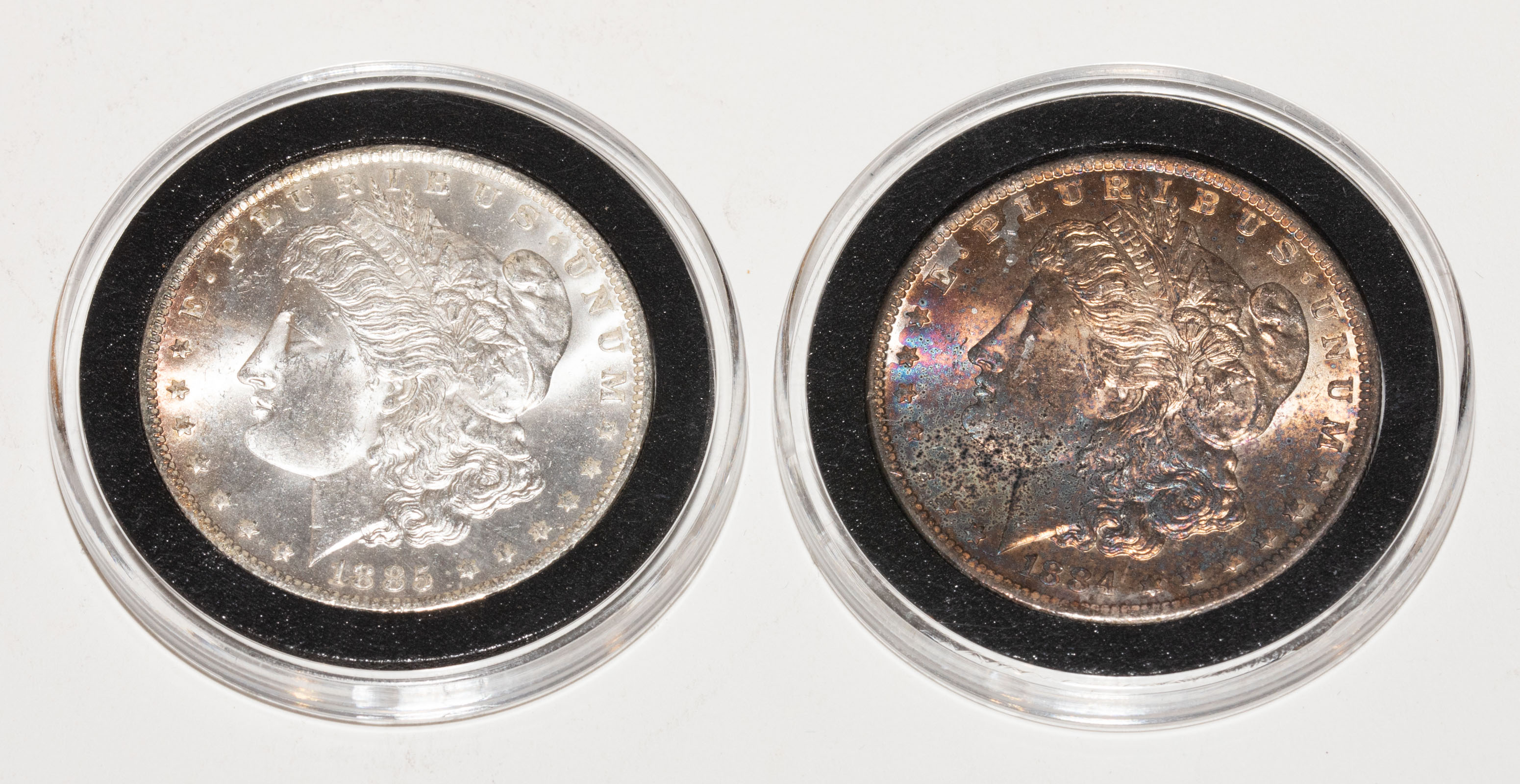 TWO TONED MORGAN DOLLARS 1884 O 334dc0