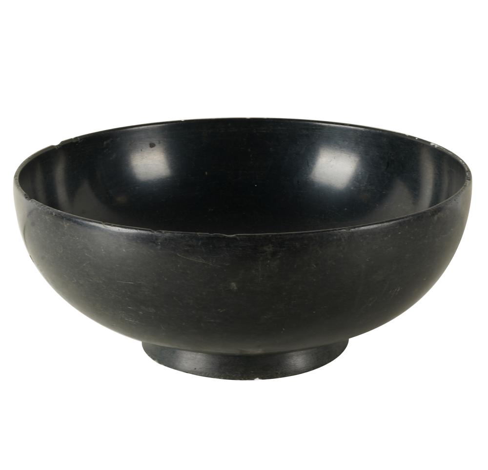 CARVED BLACK STONE BOWLProvenance: The