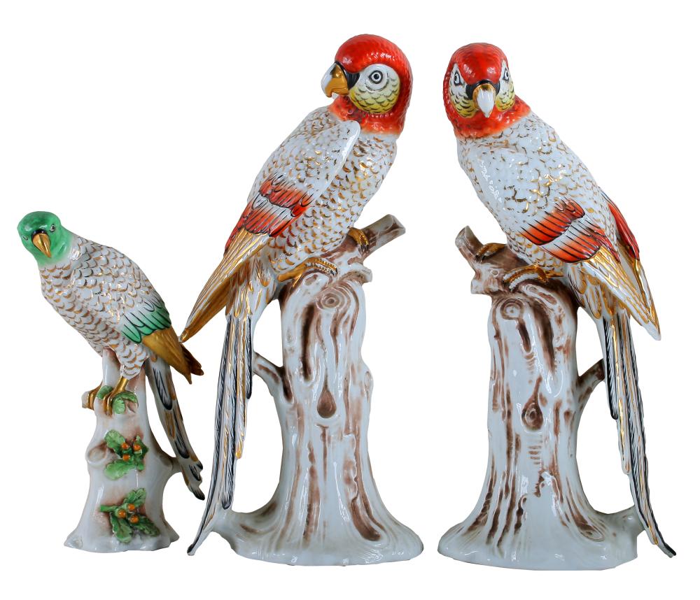 THREE PORCELAIN PARROT FIGUREScomprising