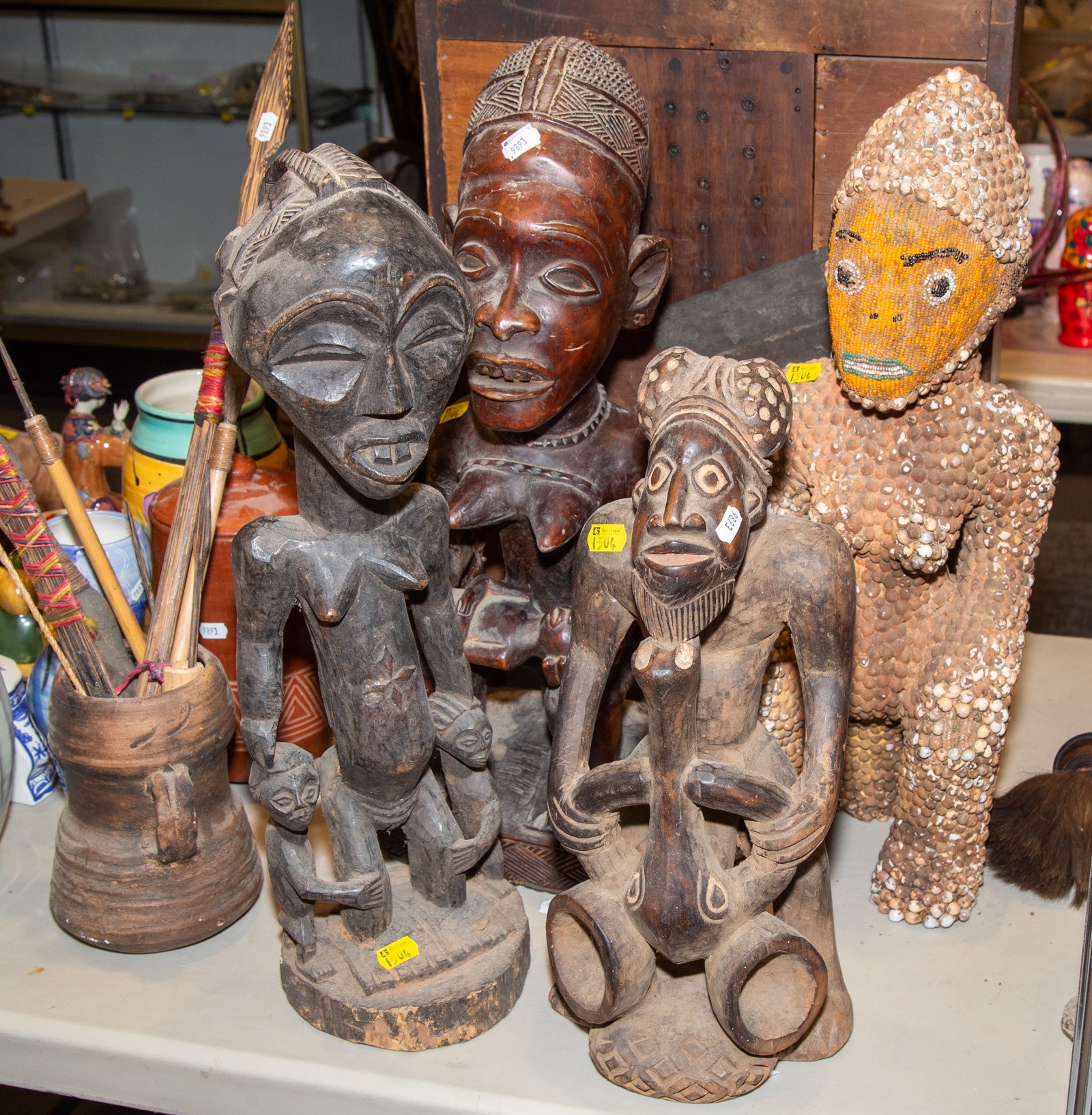 FOUR AFRICAN CARVED WOODEN FIGURES 335005