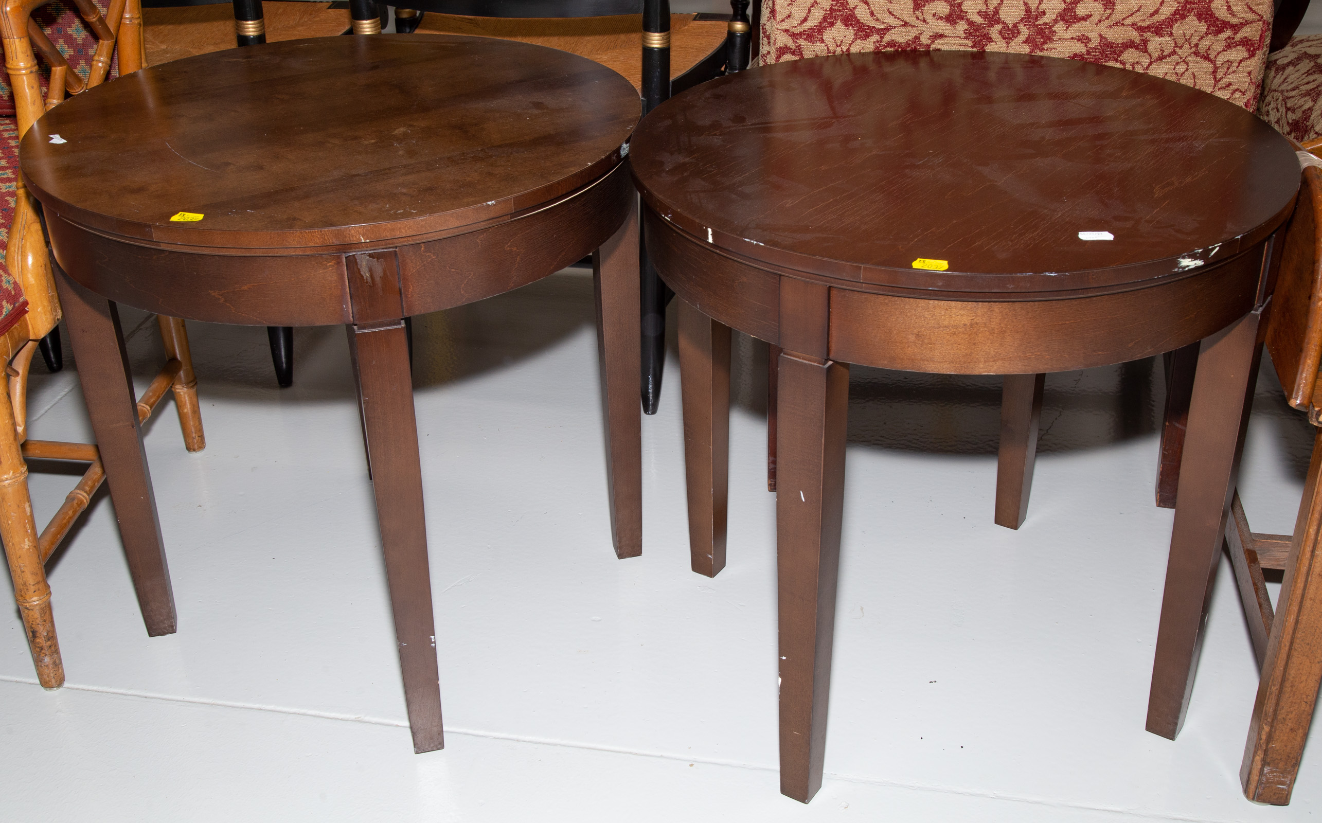 A PAIR OF ROUND END TABLES 22 1/2 in.