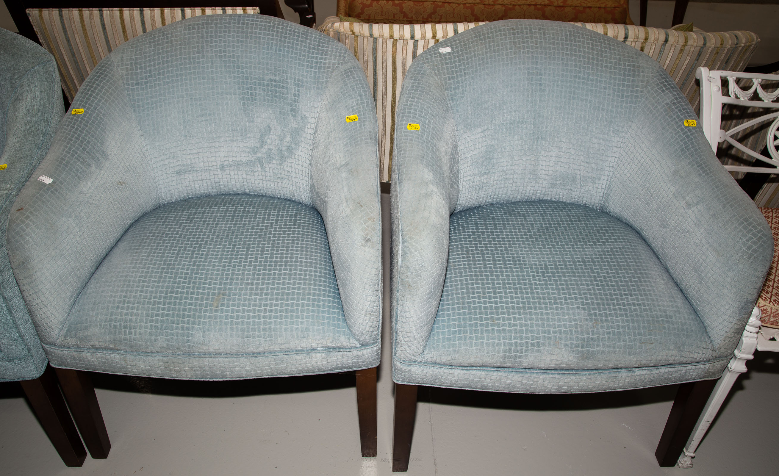 A PAIR OF BARREL BACK CLUB CHAIRS