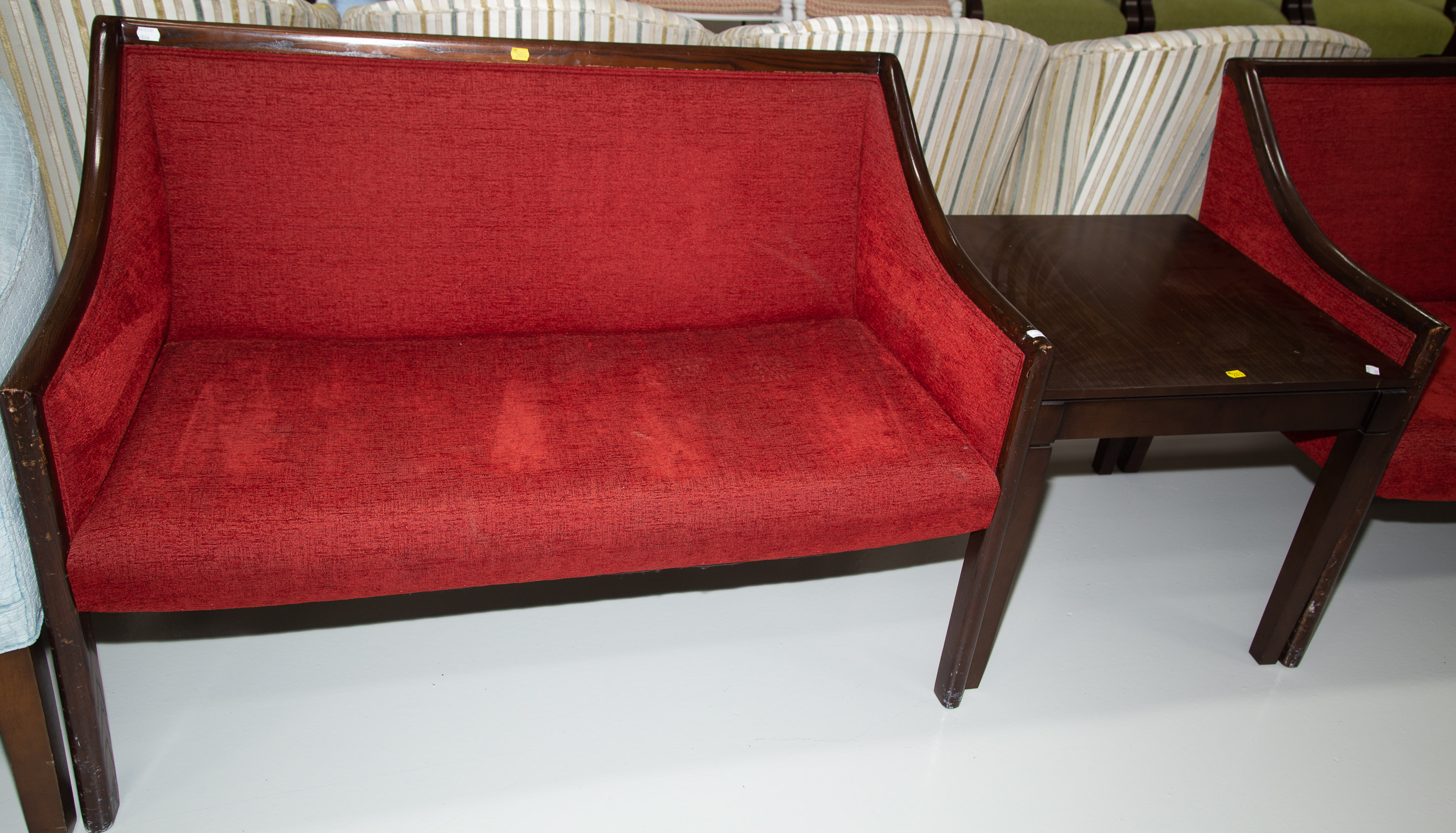 A PAIR OF RED UPHOLSTERED SOFAS & SIDE