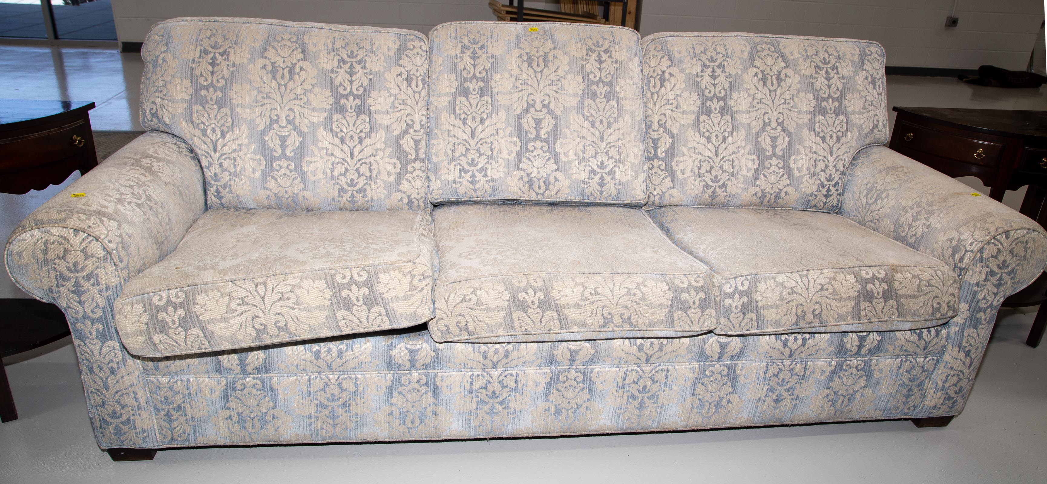 A PAIR OF DEMILUNE TABLES UPHOLSTERED 3350c2