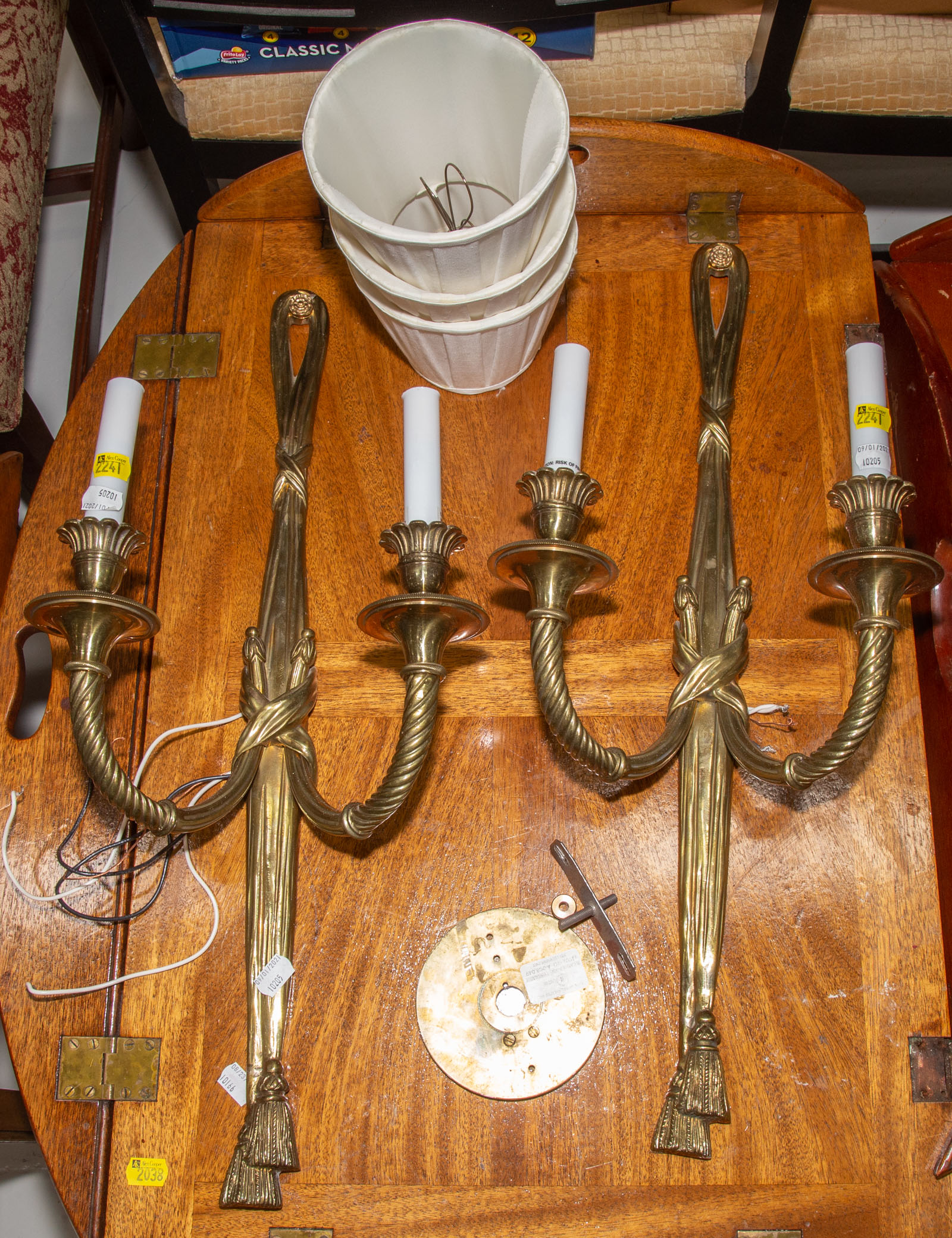 A PAIR OF BRASS ELECTRIFIED SCONCES