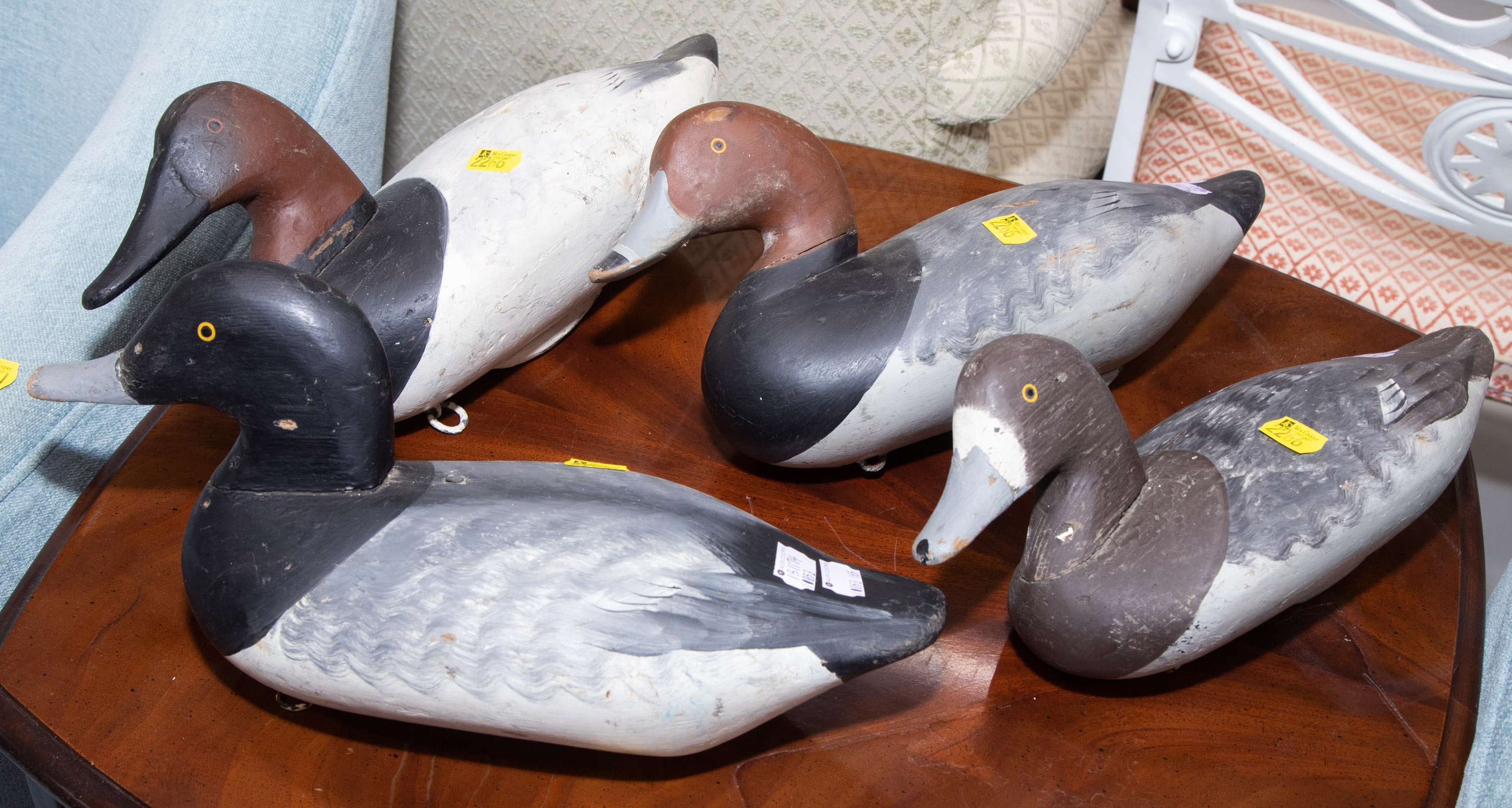 FOUR CARVED & PAINTED WORKING DUCK DECOYS