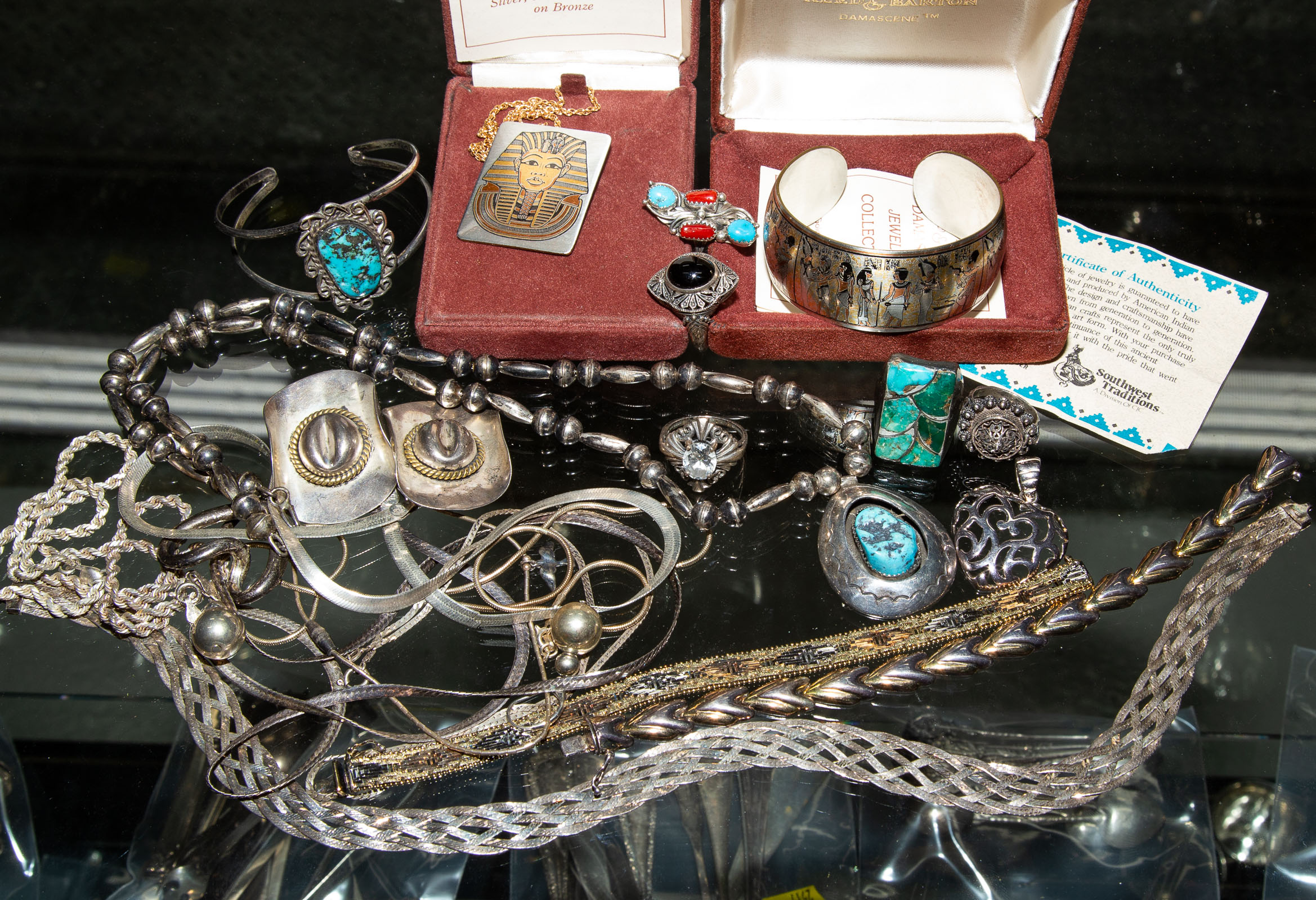 A COLLECTION OF SILVER JEWELRY Including