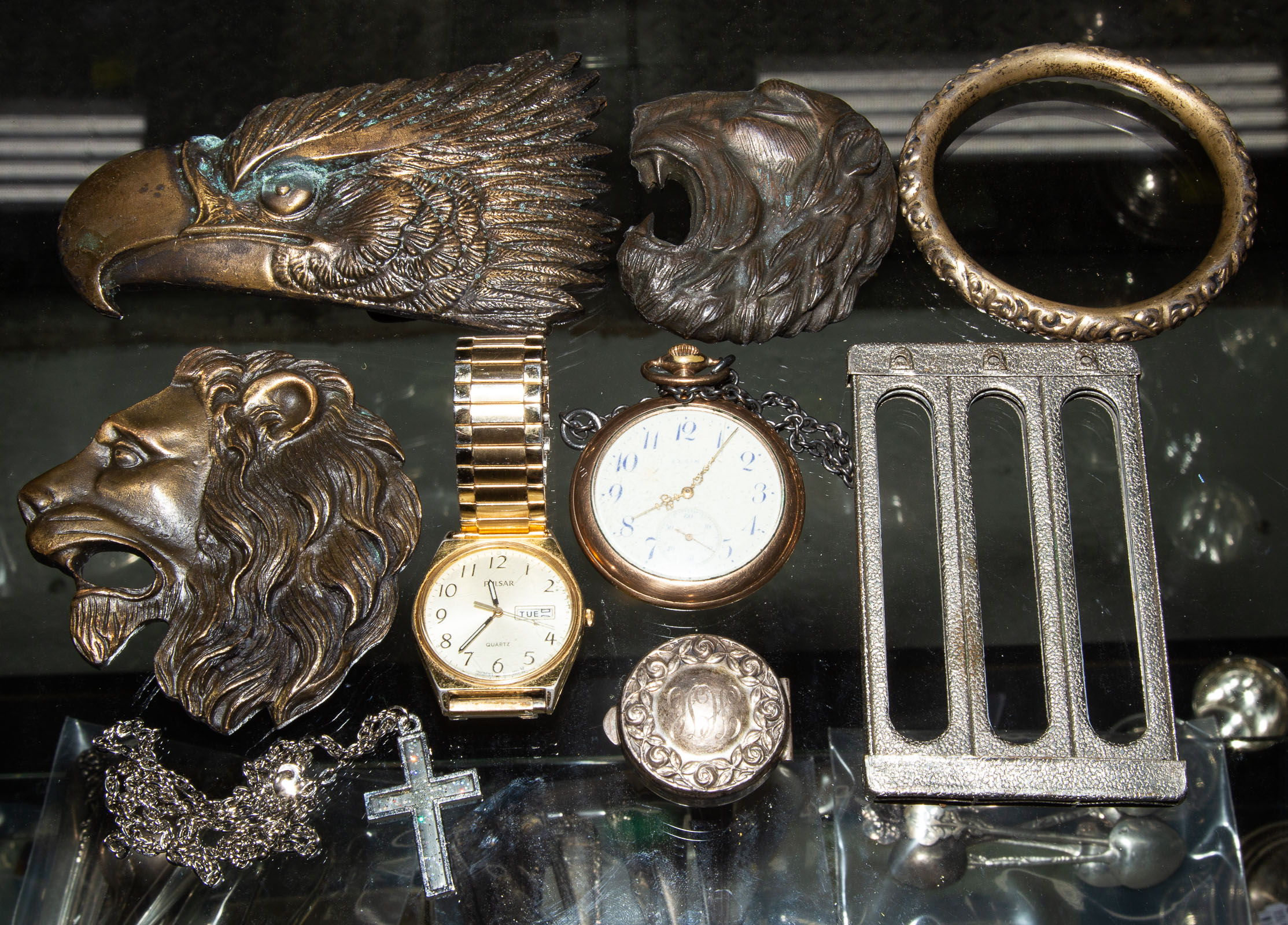 A COLLECTION OF BELT BUCKLES &