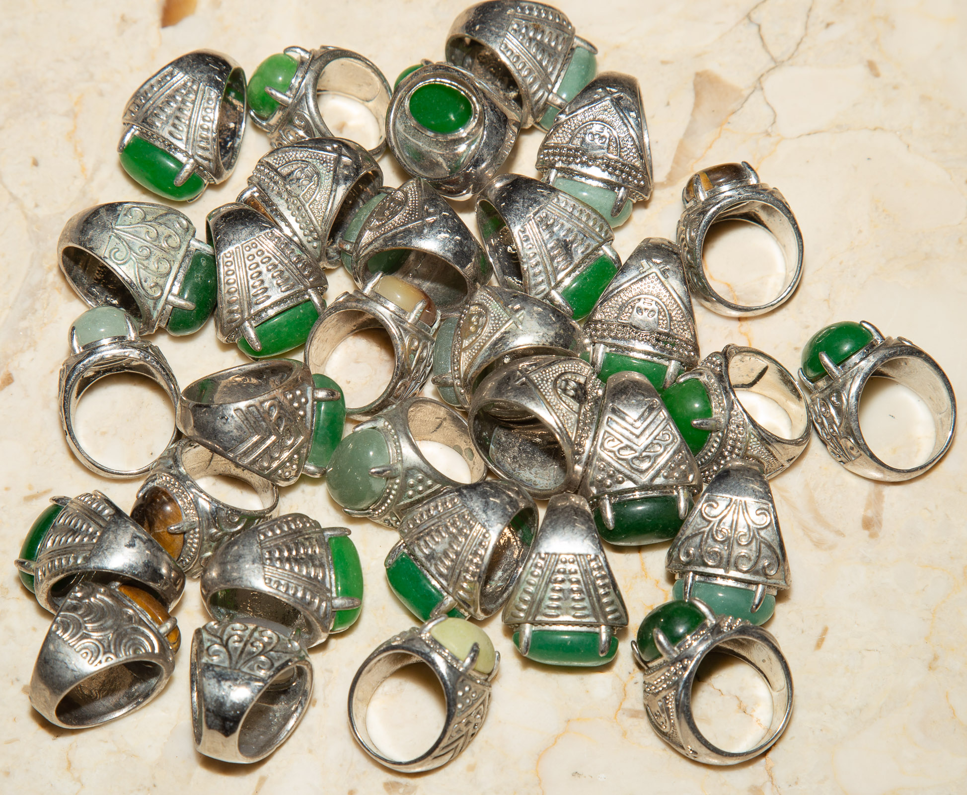 GROUP OF SILVERED METAL RINGS With hardstone