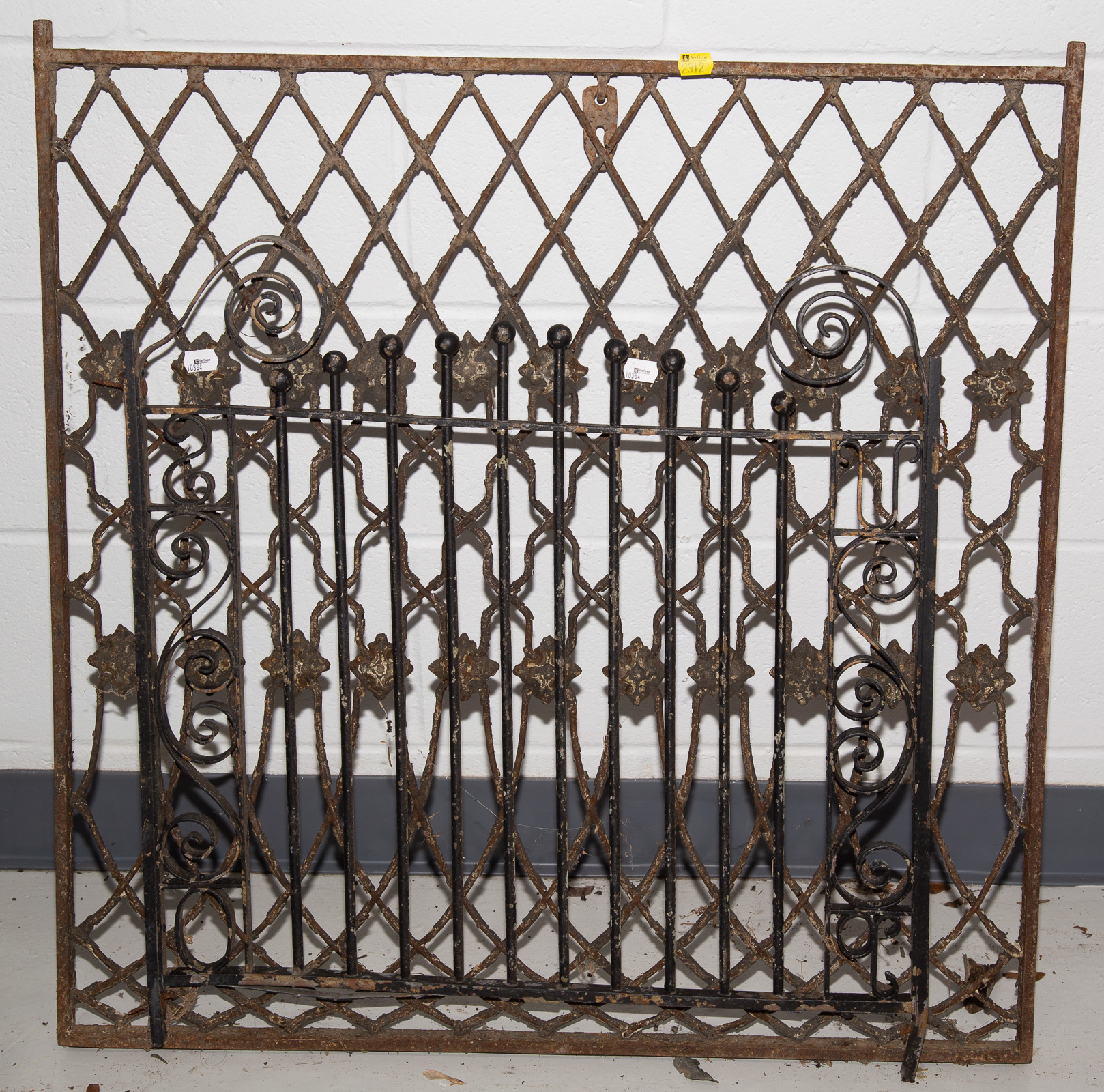 TWO PIECES OF WROUGHT IRON Includes