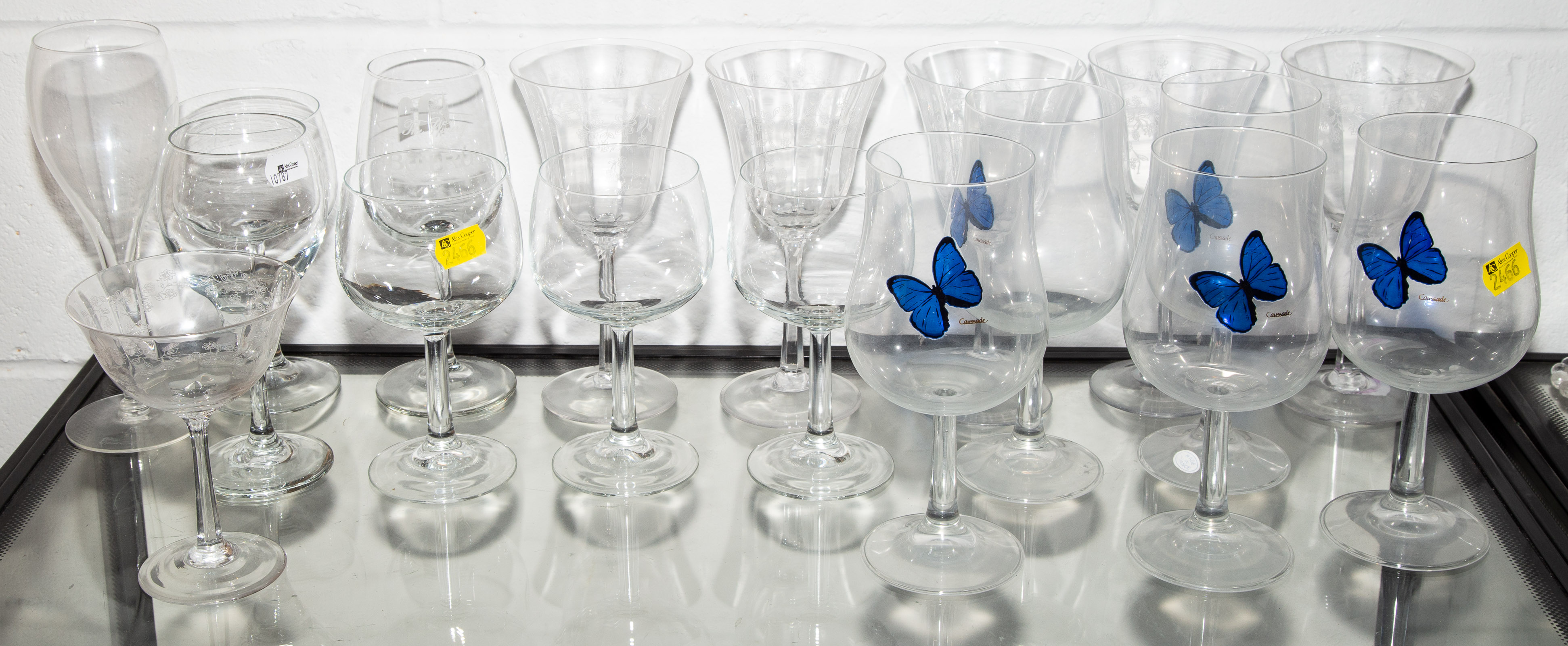 ASSORTMENT OF COLORLESS STEMWARE .