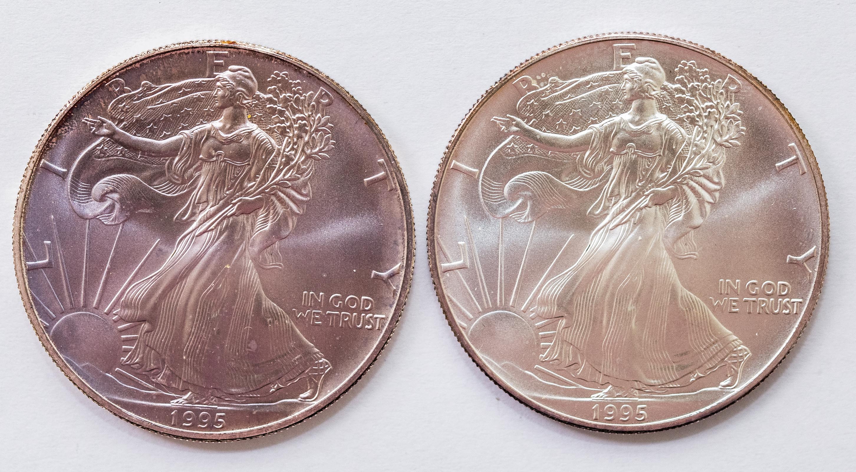 A PAIR OF 1995 SILVER AMERICAN