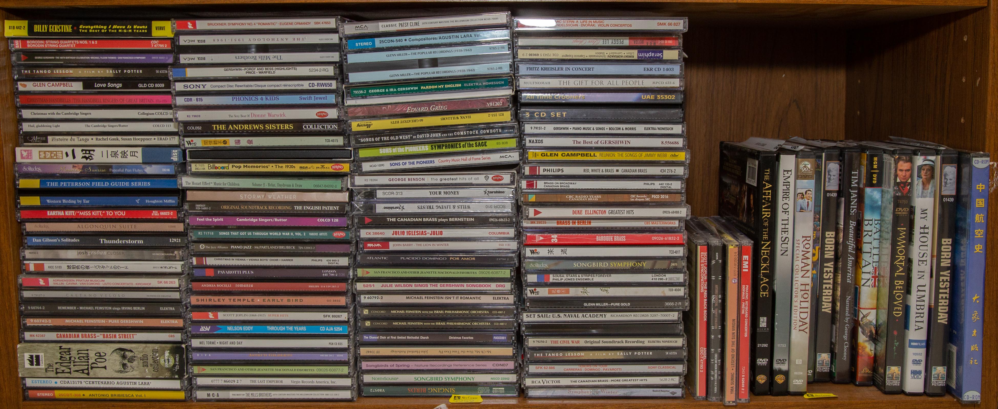 SELECTION OF CDS & DVDS Comprising