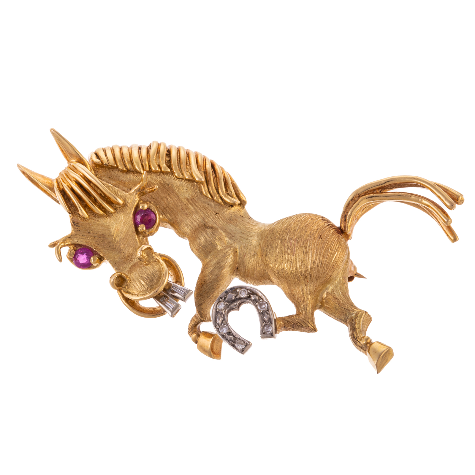 A HORSE PIN WITH RUBY EYES IN 18K