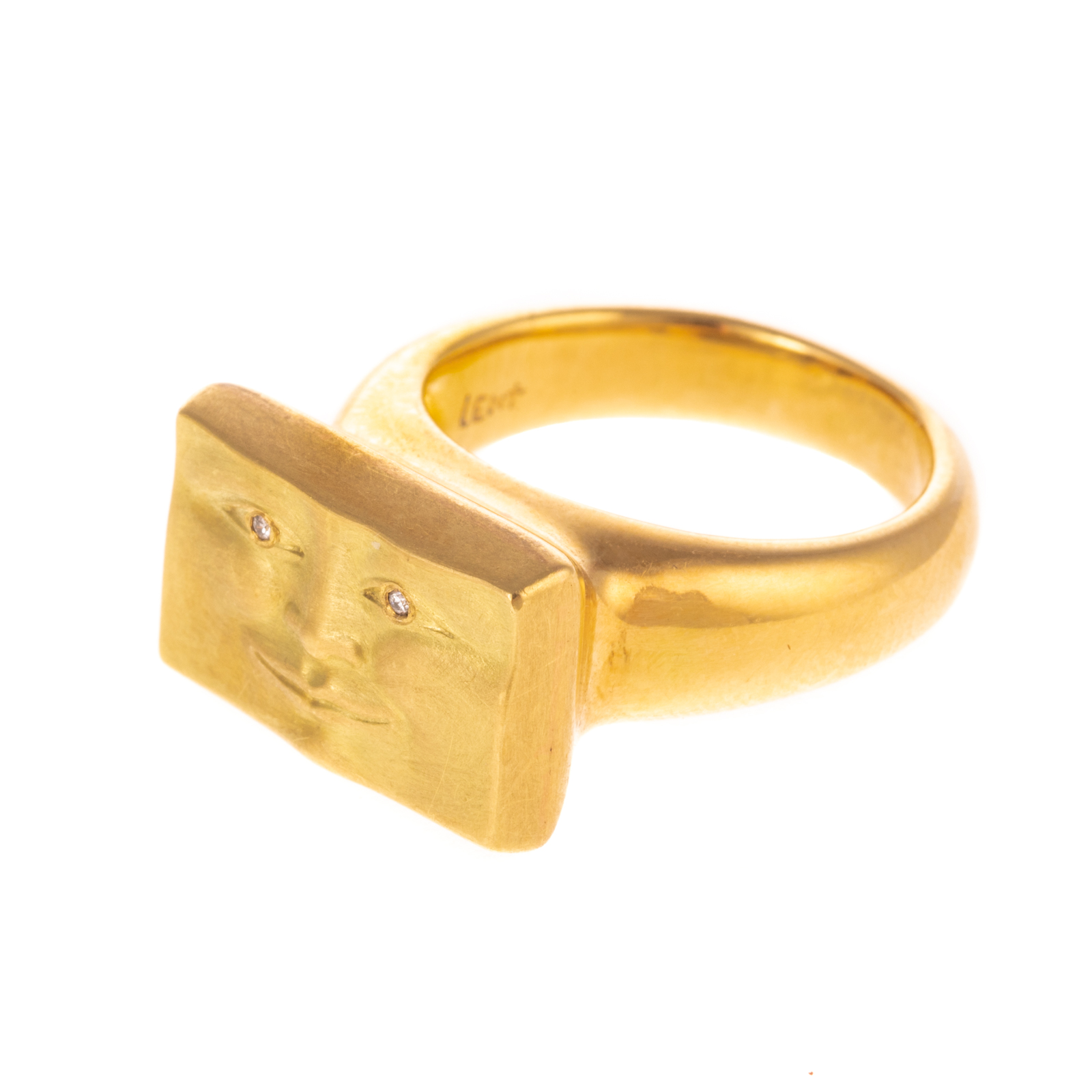 A SOLID 18K RECTANGULAR FACE RING