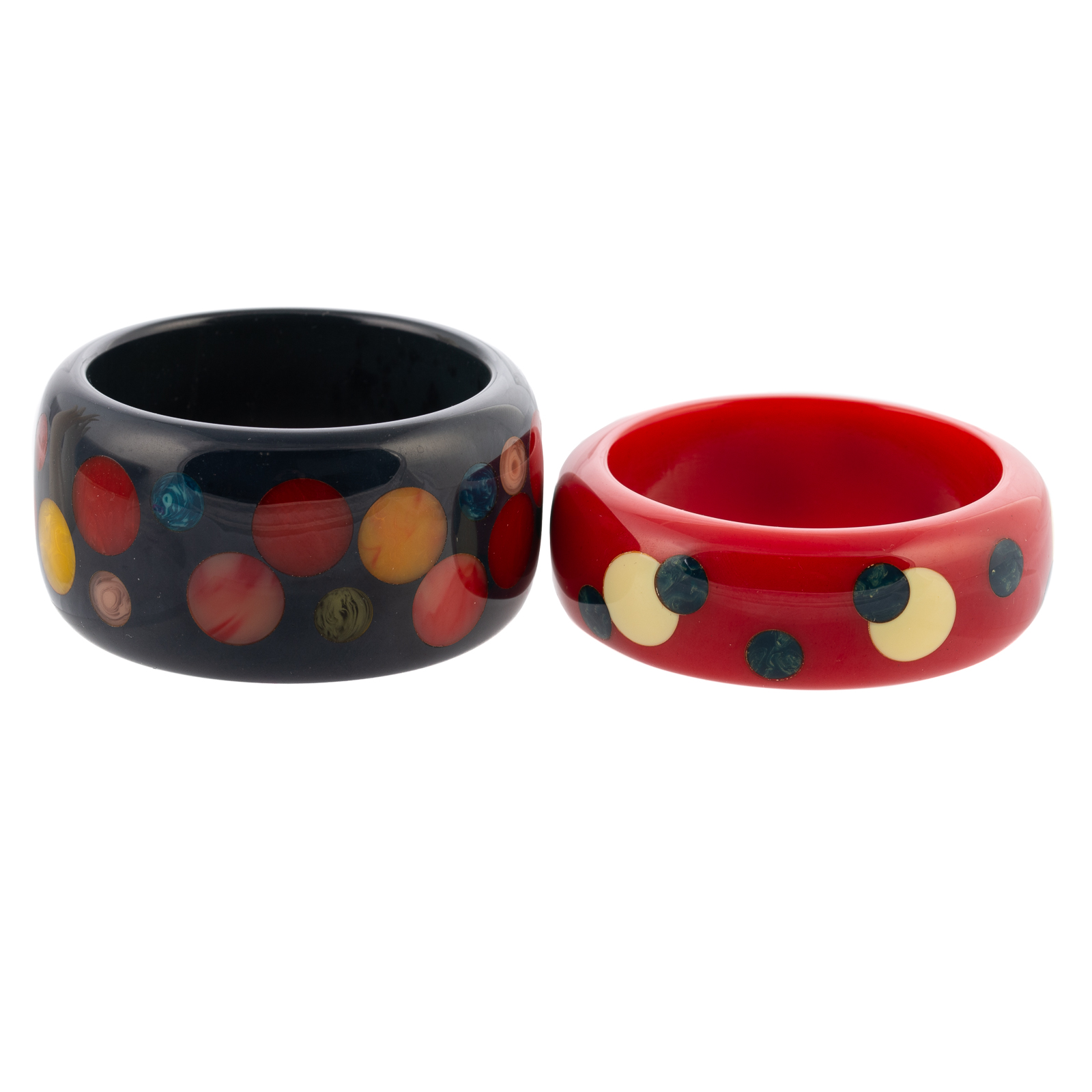 A PAIR OF POLKA-DOT BAKELITE BANGLES