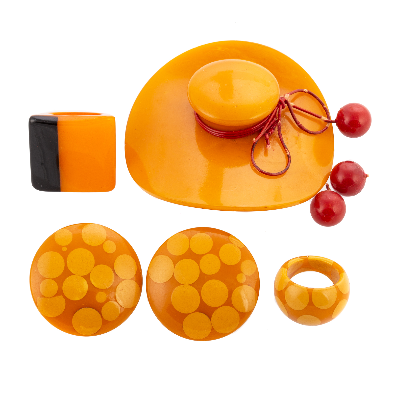 A COLLECTION OF YELLOW BAKELITE