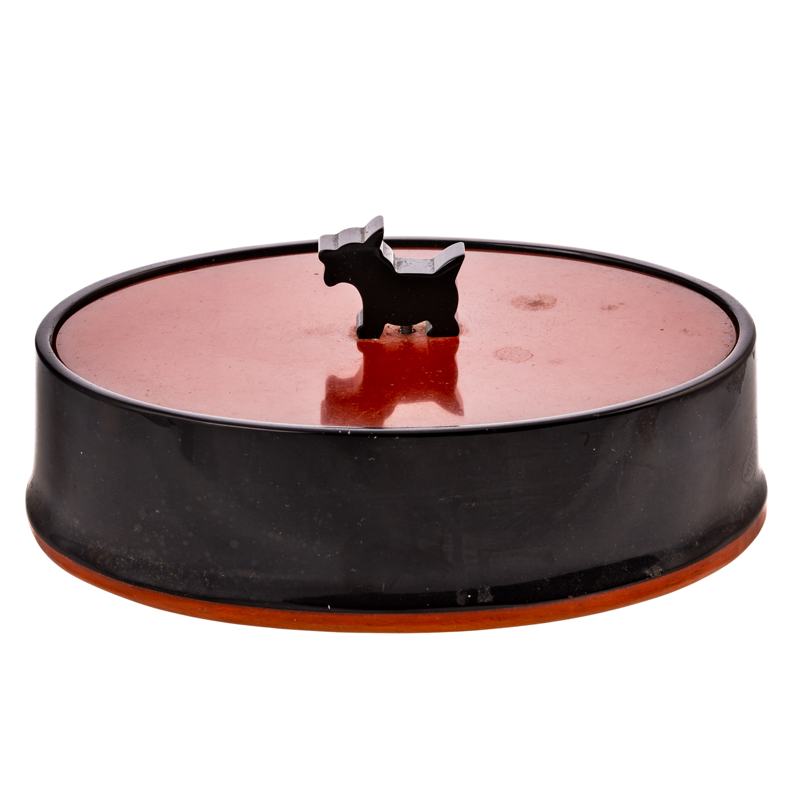 A SCOTTIE DOG OVAL BAKELITE BOX