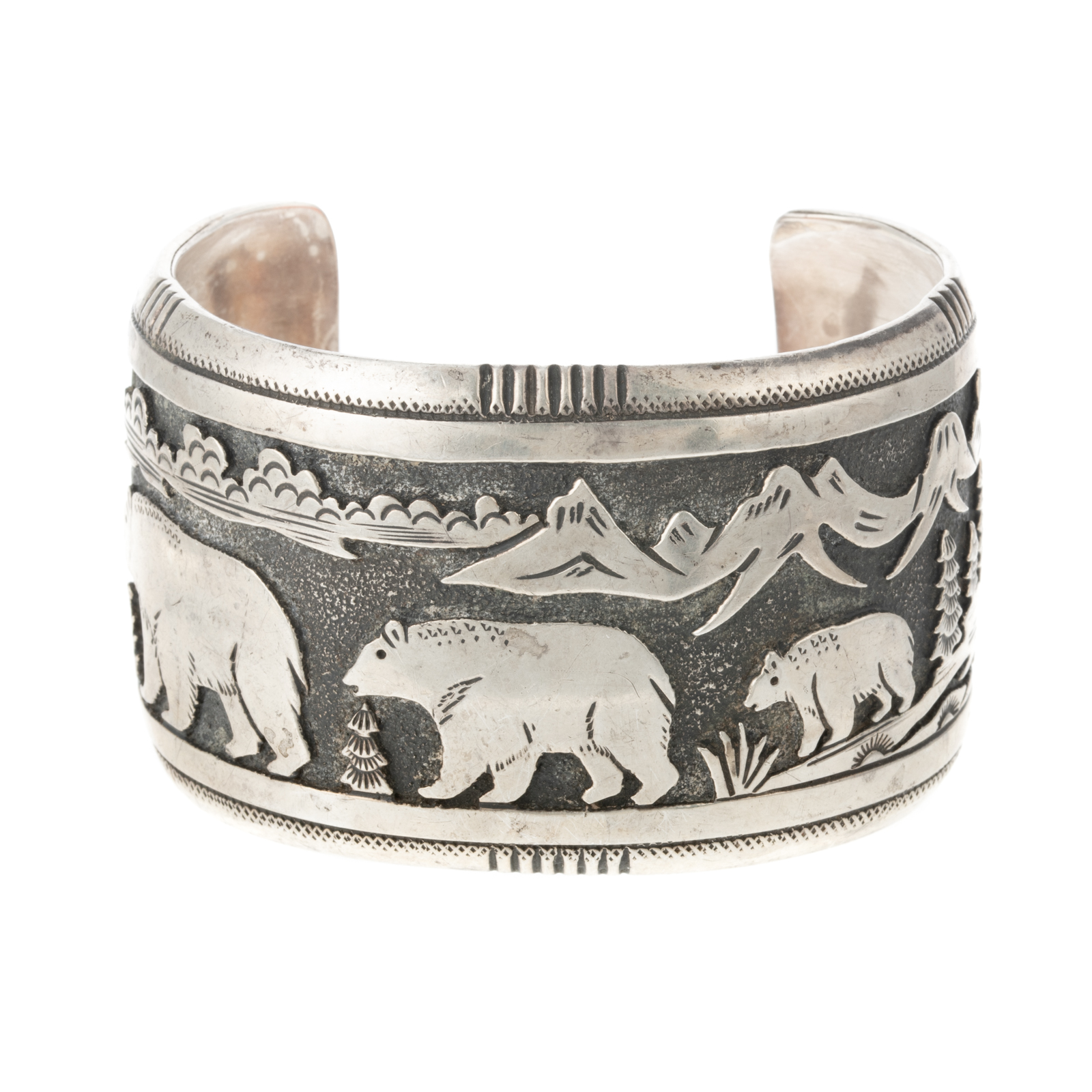 A STERLING NAVAJO CUFF BY THOMAS