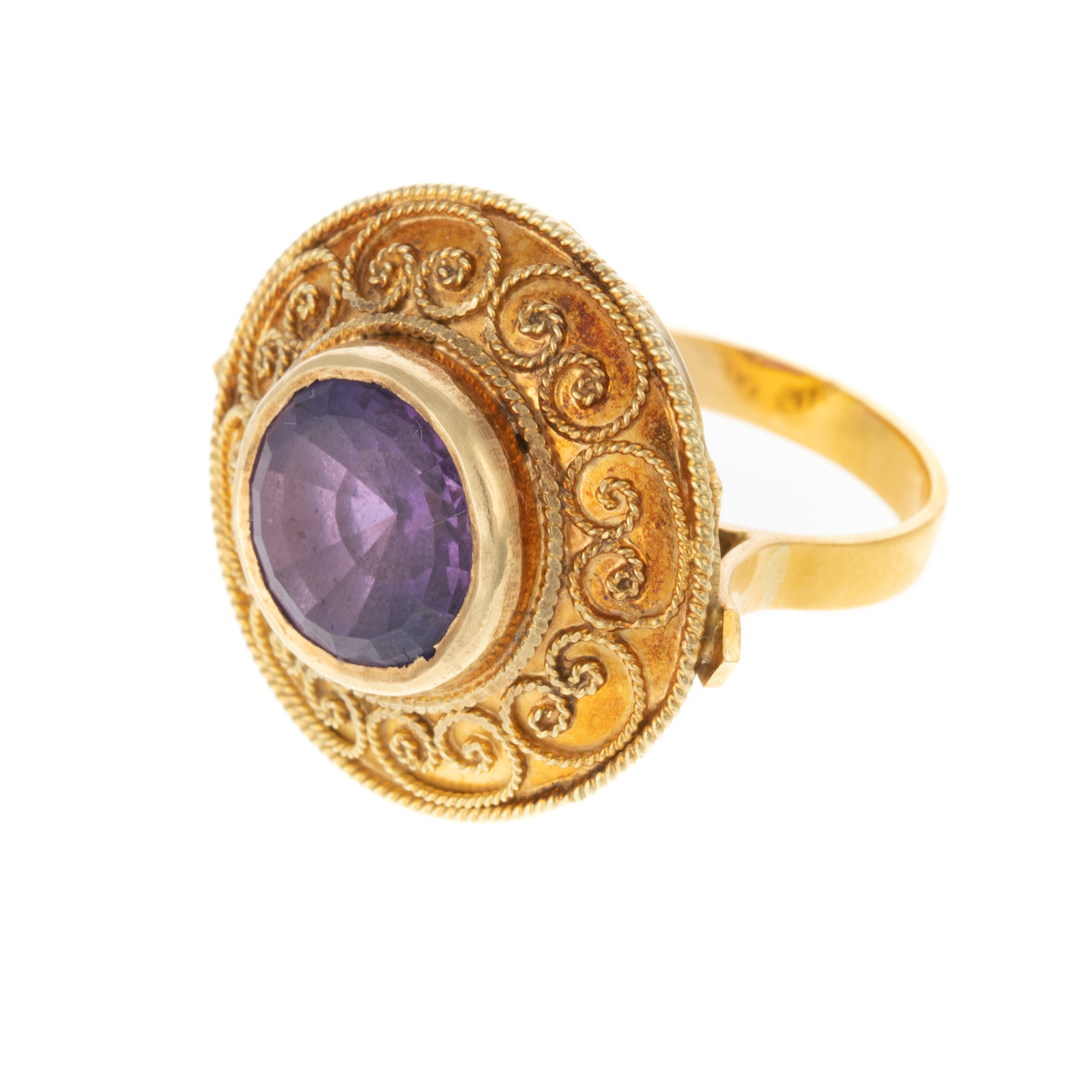 A GRANULATED SCROLL AMETHYST RING