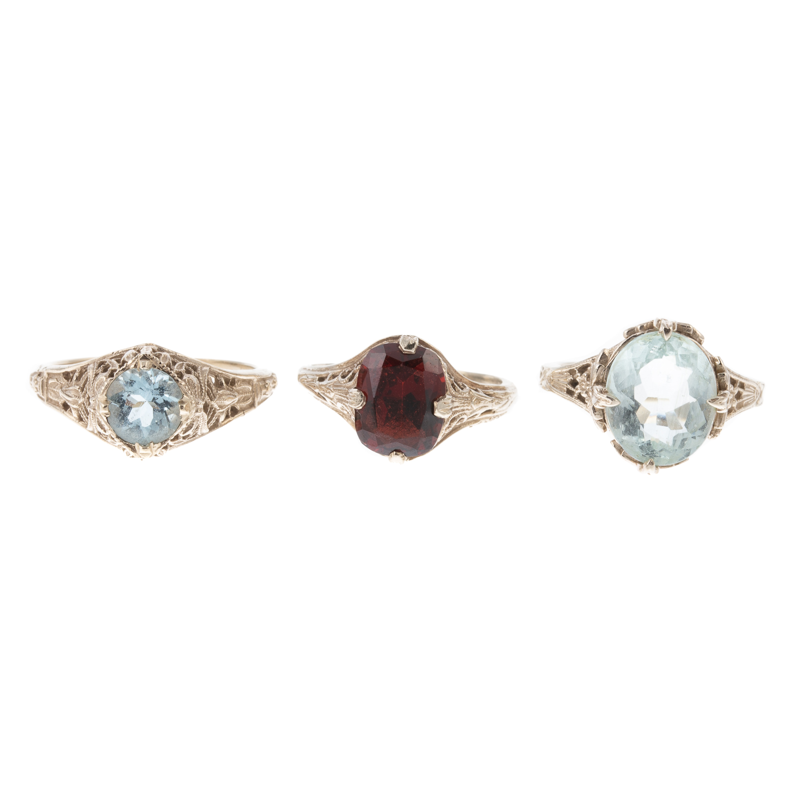 A TRIO OF GEMSTONE FILIGREE RINGS 3386ab