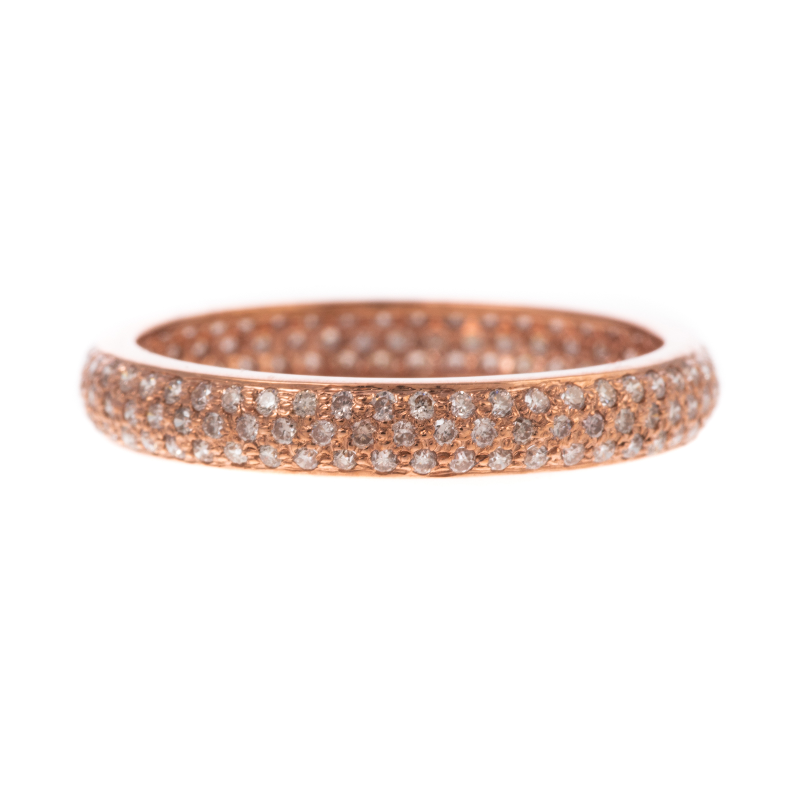 A PINK DIAMOND ETERNITY BAND IN 3386e0