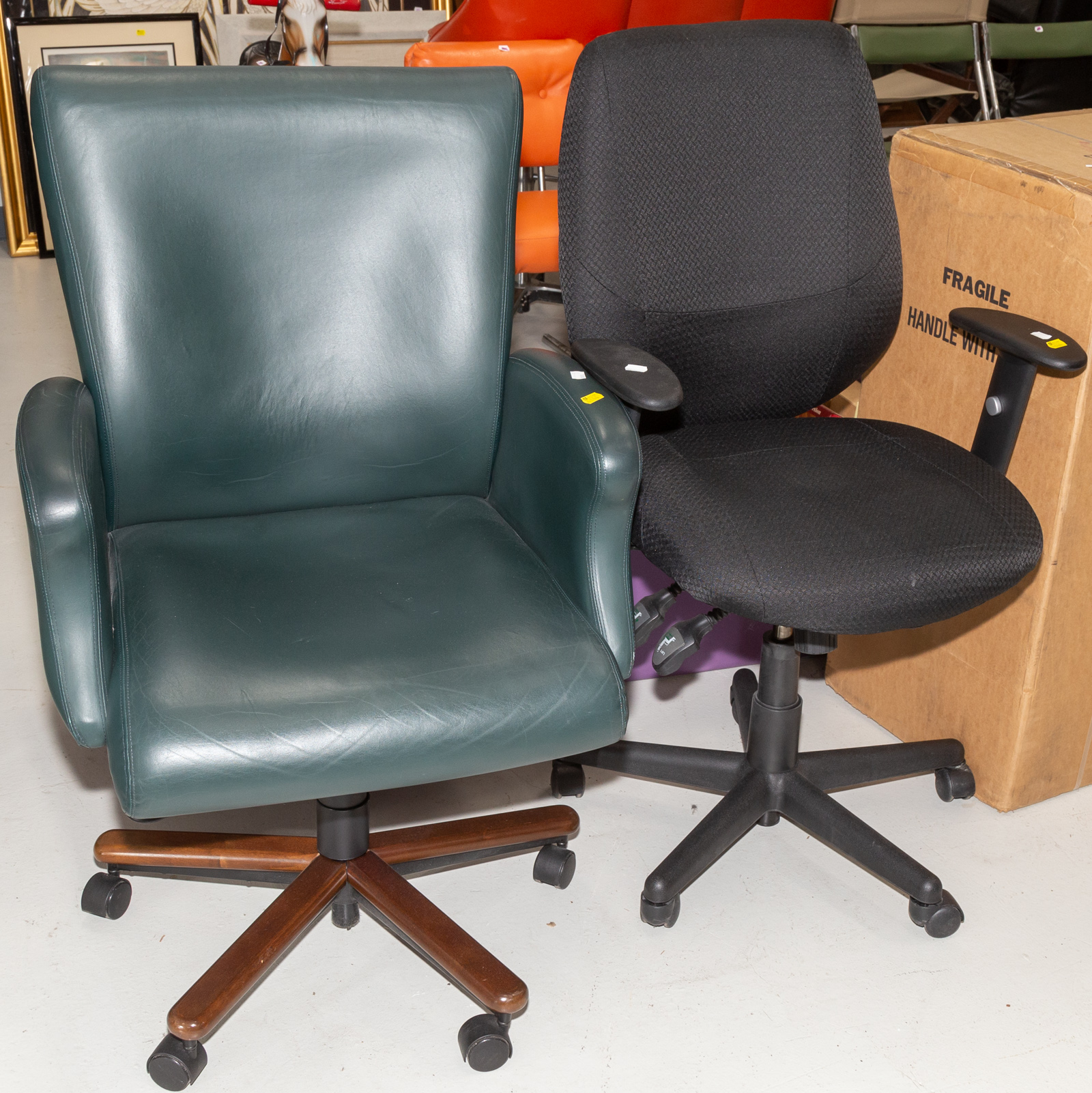 TWO MODERN OFFICE CHAIRS .