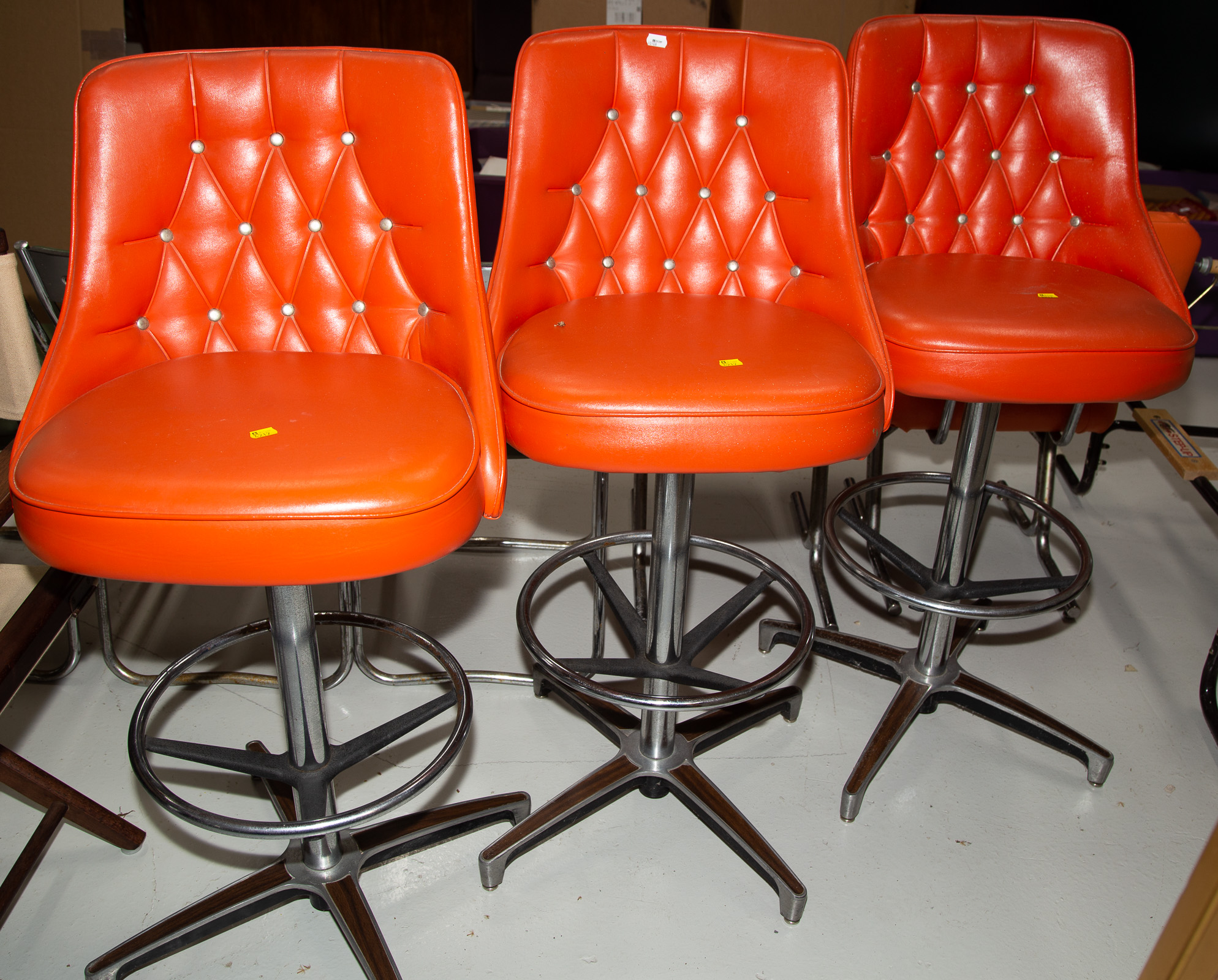 THREE CHROMECRAFT BAR CHAIRS .