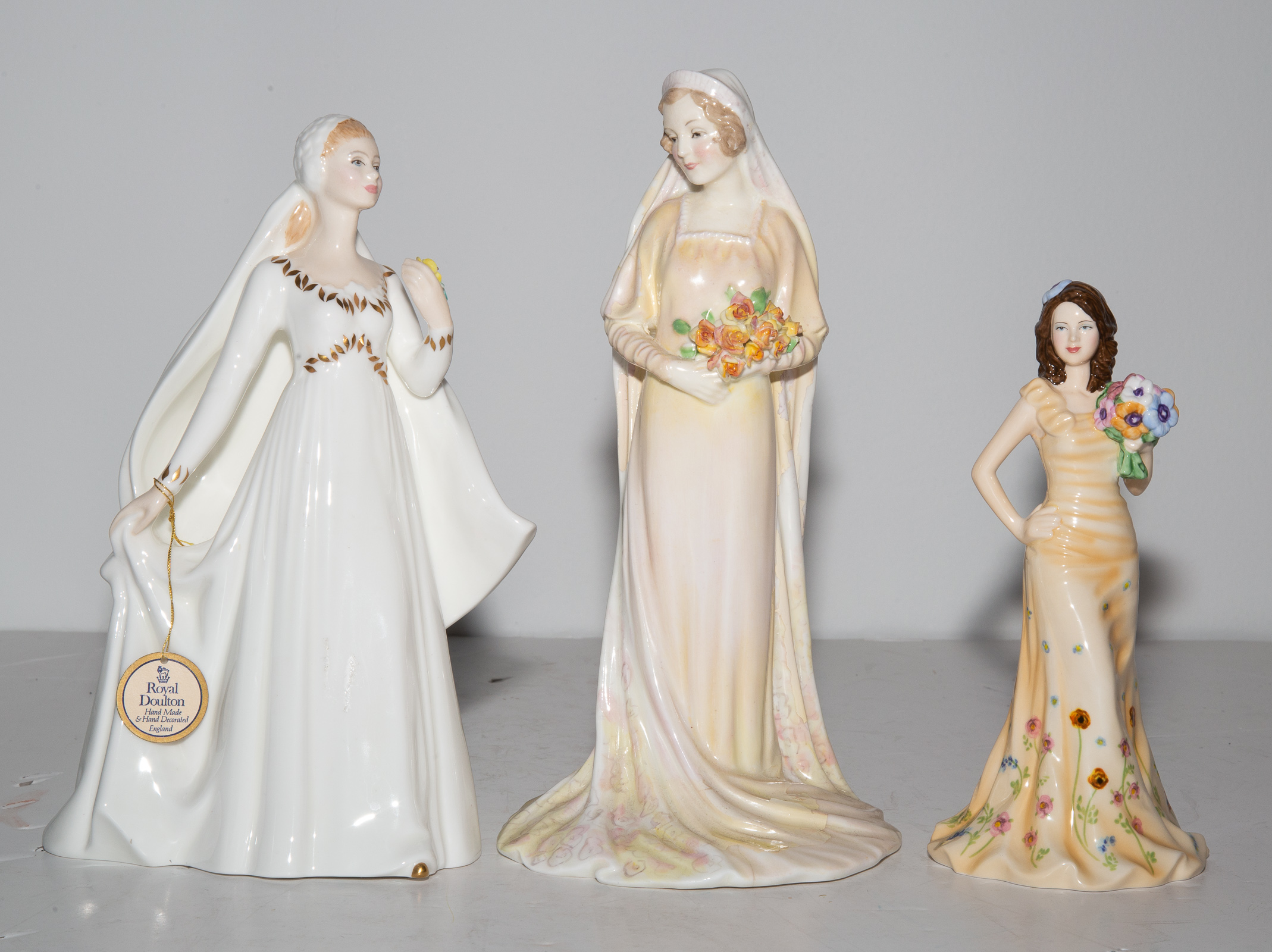 THREE ROYAL DOULTON FIGURES Including 338b4a