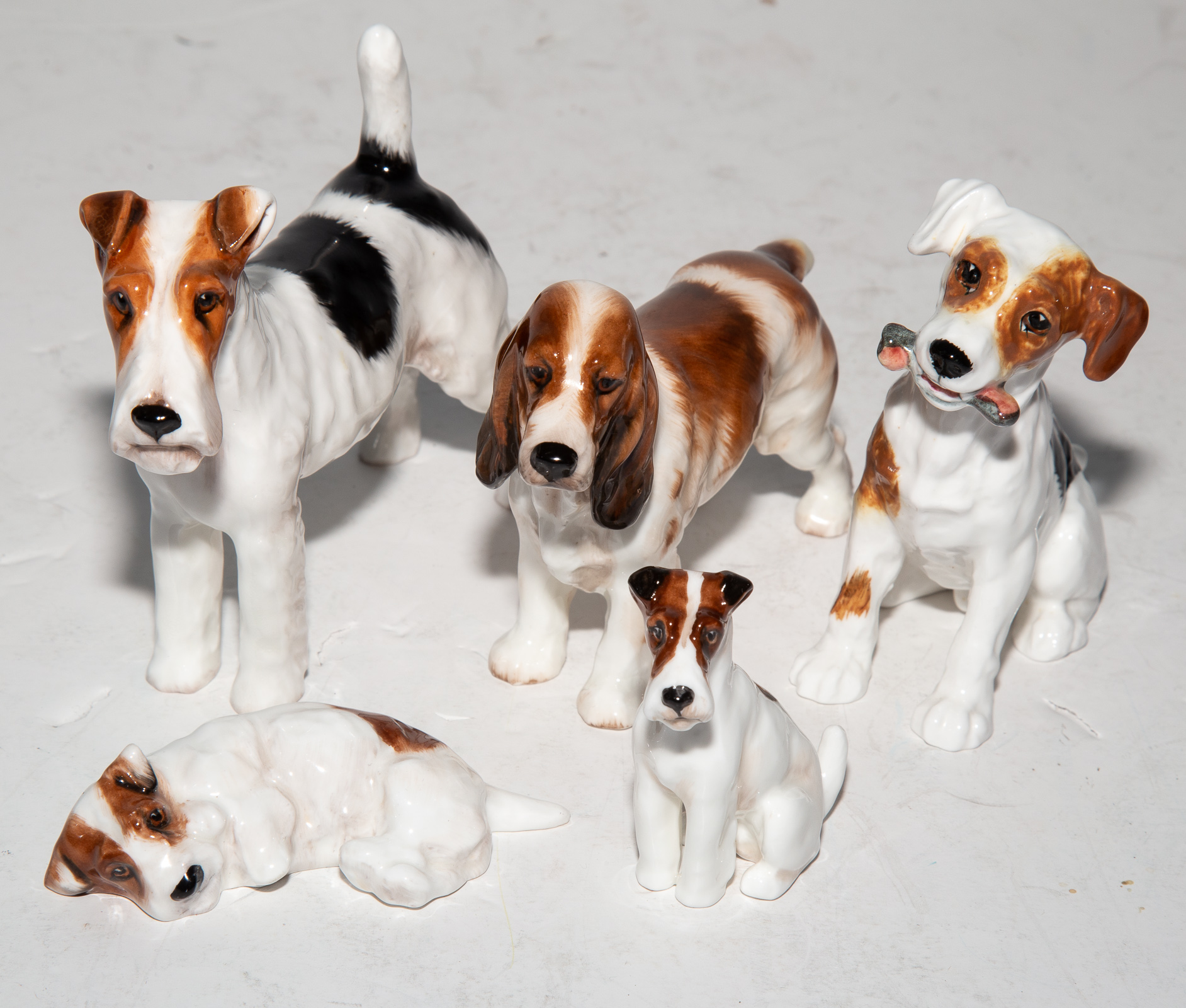 FIVE ROYAL DOULTON DOG FIGURES .