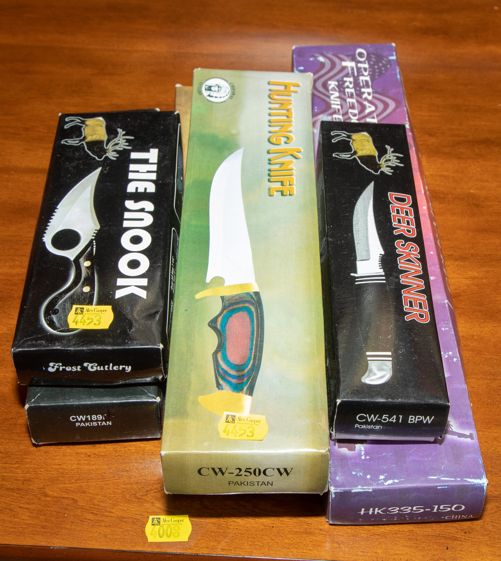 SIX BOXED MODERN HUNTING KNIVES