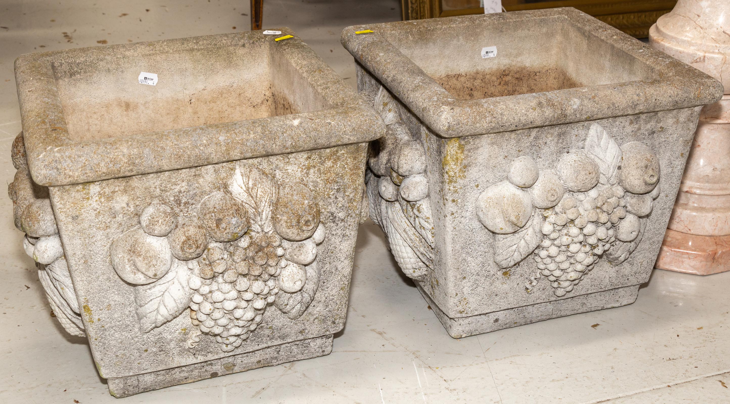 A PAIR OF CONCRETE GARDEN URNS