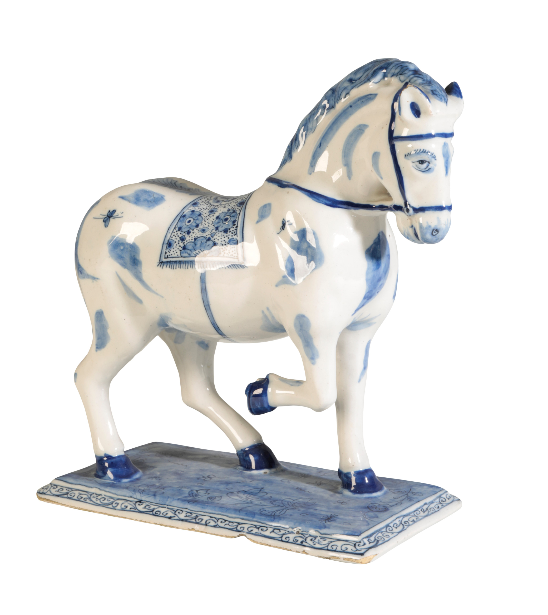 A DELFT BLUE AND WHITE MODEL OF A PRANCING