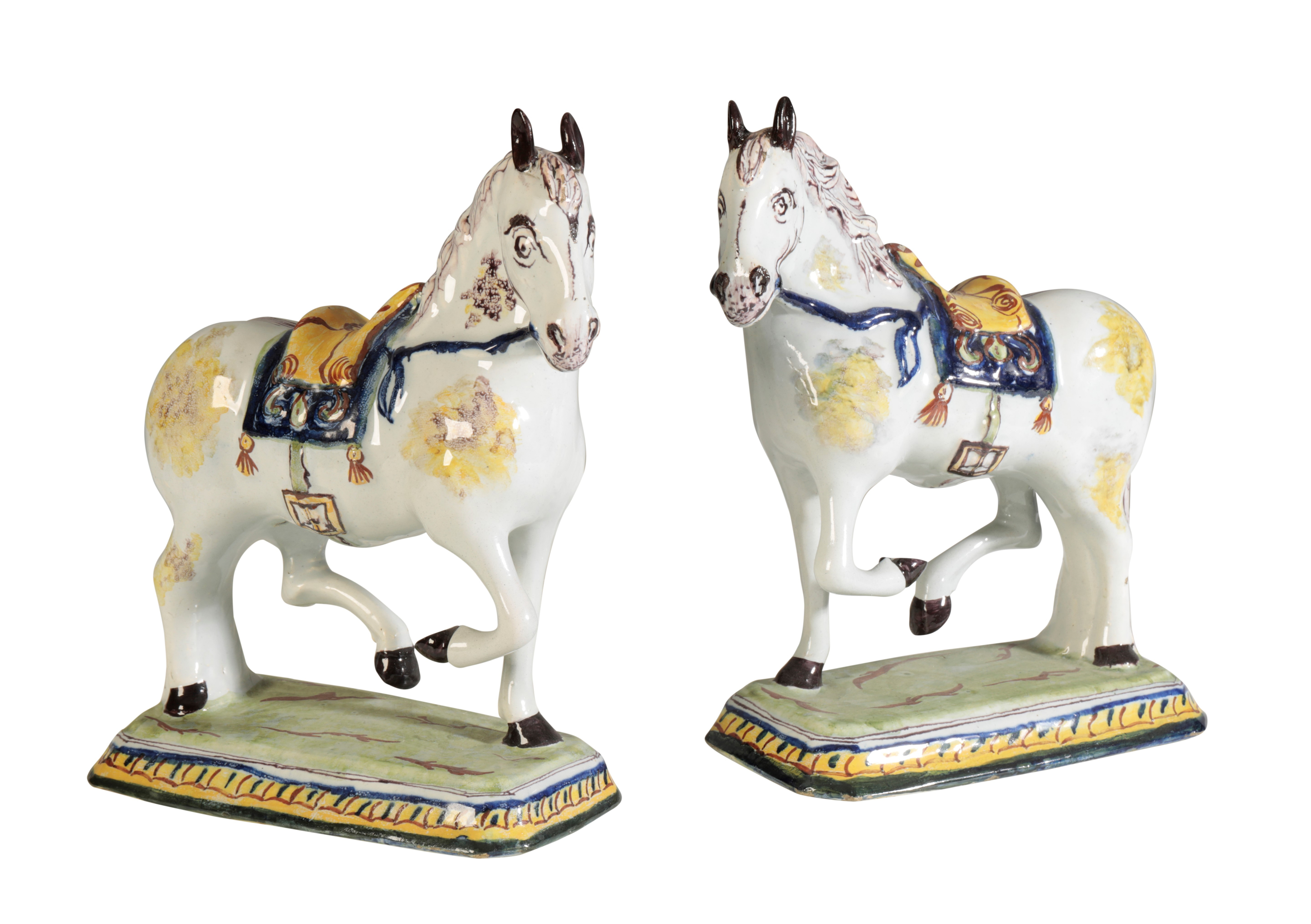 A PAIR OF DELFT POLYCHROME PRANCING