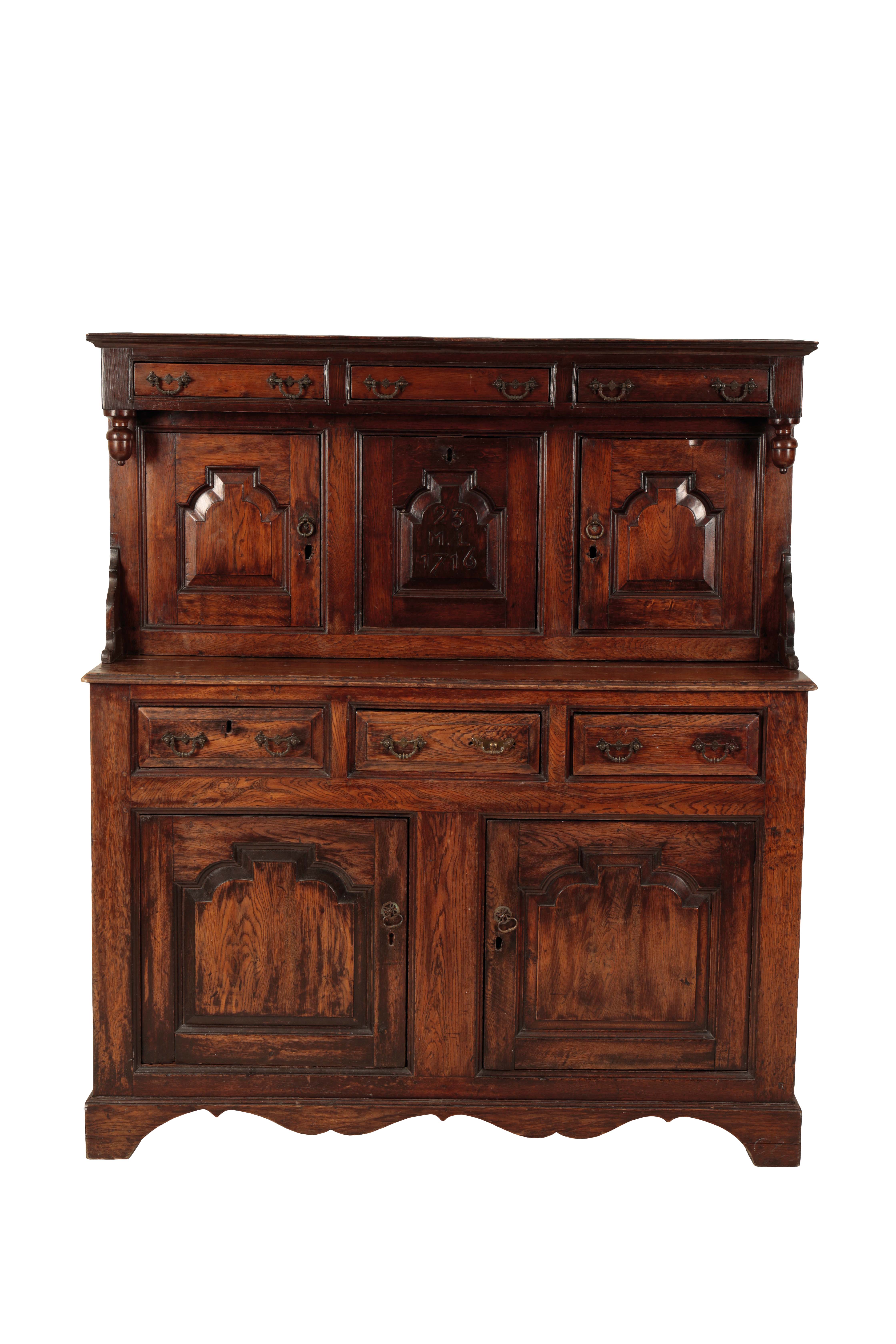 A GEORGE I OAK DUODARN CUPBOARD,