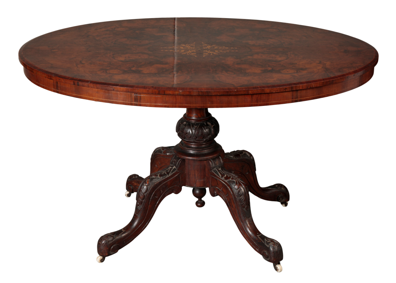 A MID-VICTORIAN WALNUT OVAL BREAKFAST-TABLE