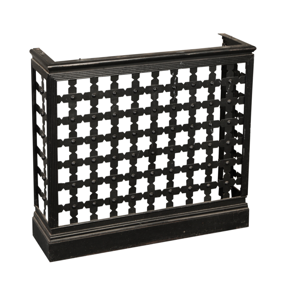 A PAINTED WROUGHT IRON RADIATOR