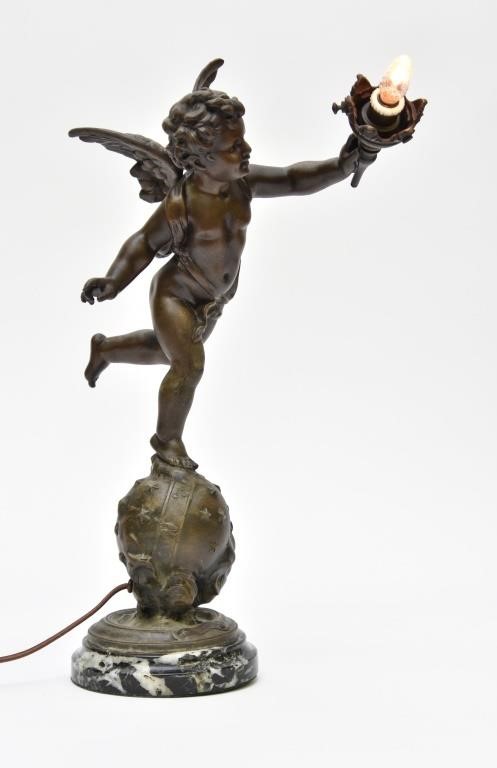 Faux bronze cherub lamp on a marble 3391a1