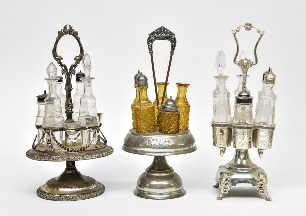 Three Victorian plated cruet sets, each