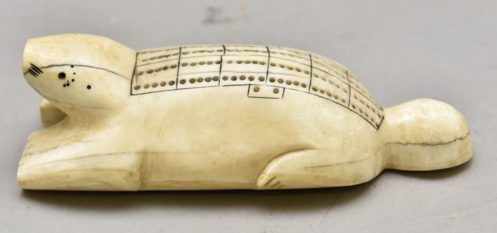 Inuit carved cribbage board, late