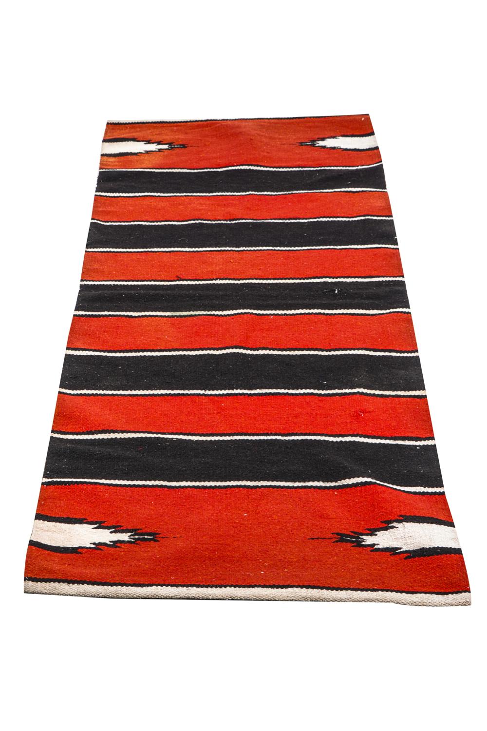 NAVAJO-STYLE CARPETwith slight